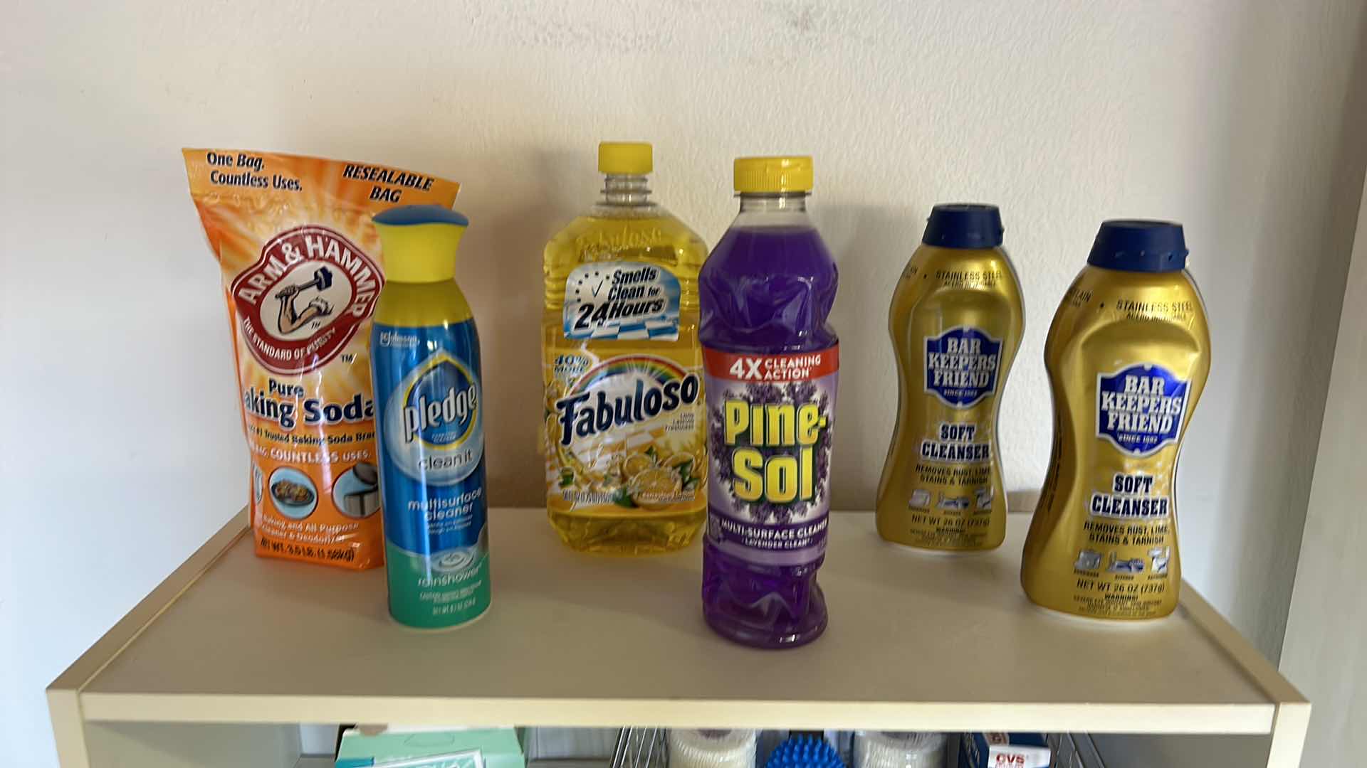 Photo 2 of BOOKSHELF W CLEANING AND FIRST AID SUPPLIES