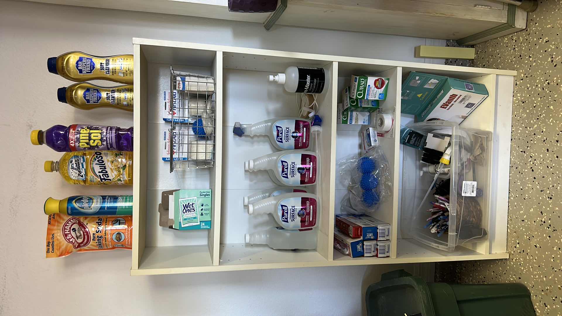 Photo 7 of BOOKSHELF W CLEANING AND FIRST AID SUPPLIES