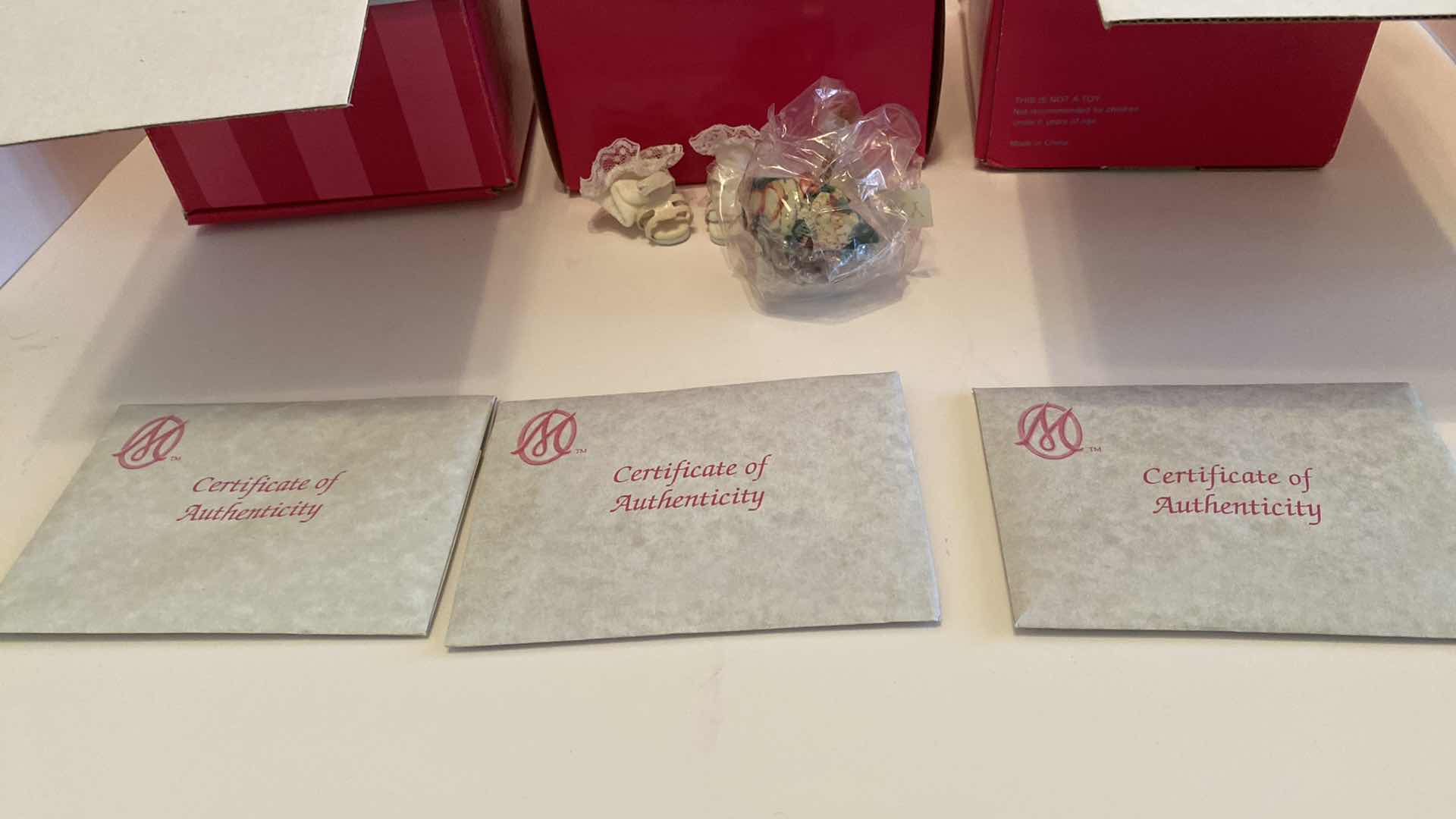 Photo 1 of MARIE OSMOND FINE PORCELAIN COLLECTIBLES DOLLS H 5.5” FROM SITTING POSITION