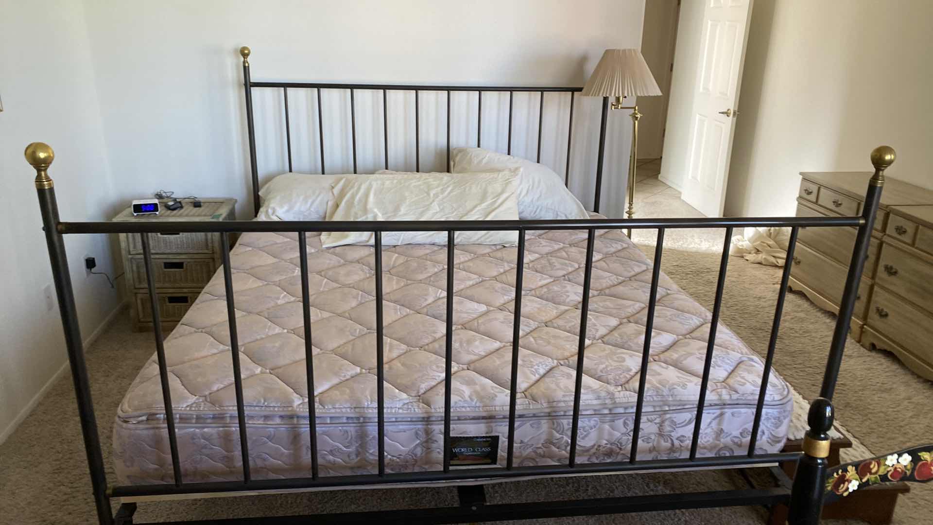 Photo 1 of KING IRON BED WITH SIMMONS MATTRESS 76” X 87” H 56”
