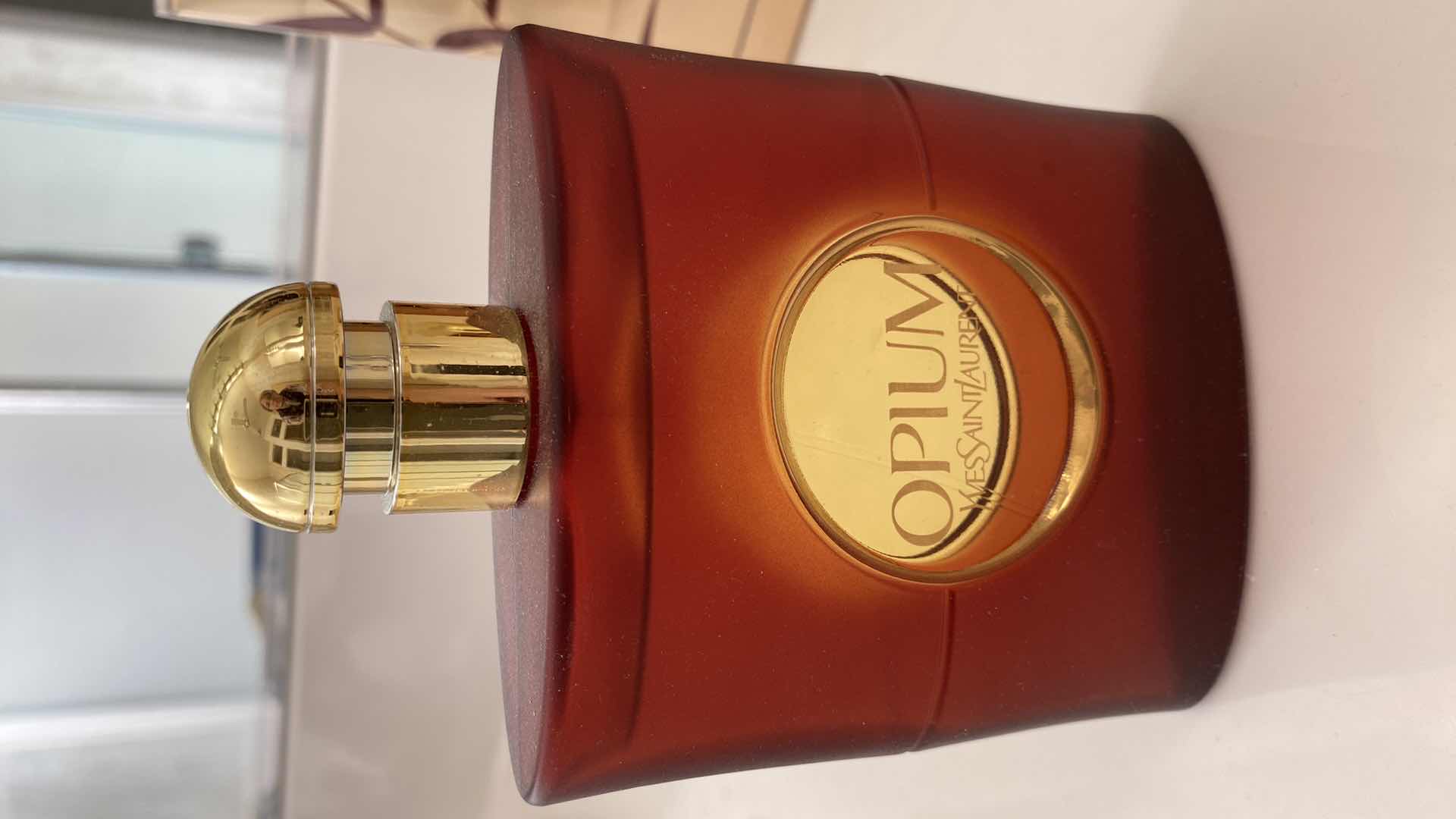 Photo 1 of NEW OPIUM PARFUM 3 oz AND OPEN BOTTLE  ALMOST FULL AND MORE