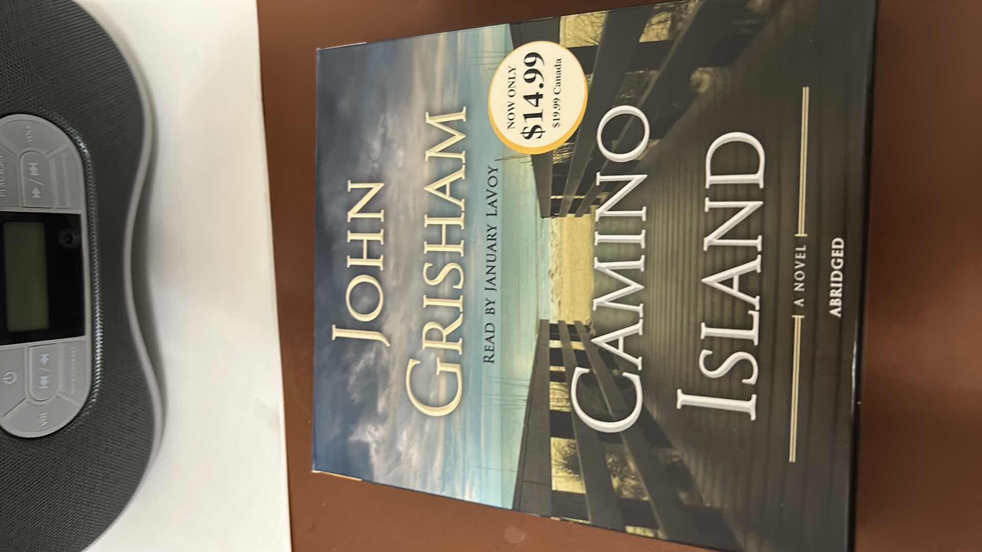 Photo 4 of CD PLAYER AND JOHN GRISHAM CD SETS