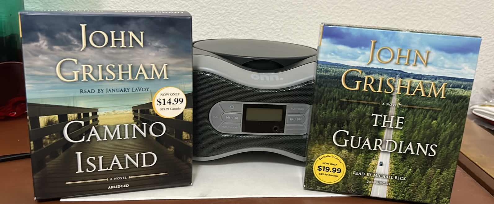 Photo 1 of CD PLAYER AND JOHN GRISHAM CD SETS