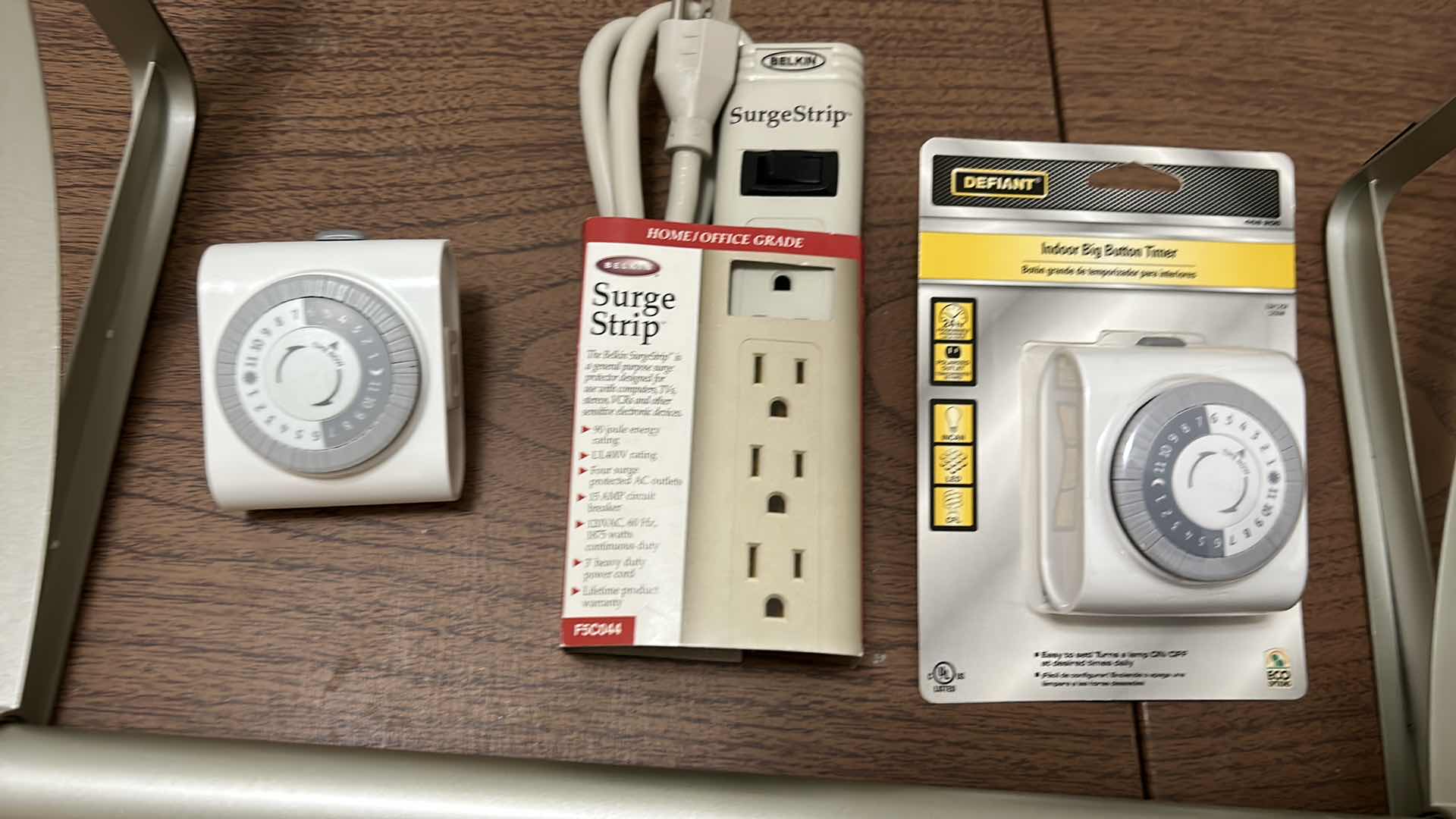 Photo 1 of HOME ASSORTMENT, 2 OVER THE DOOR RODS, 2 UMBRELLAS, TIMERS AND SURGE STRIP