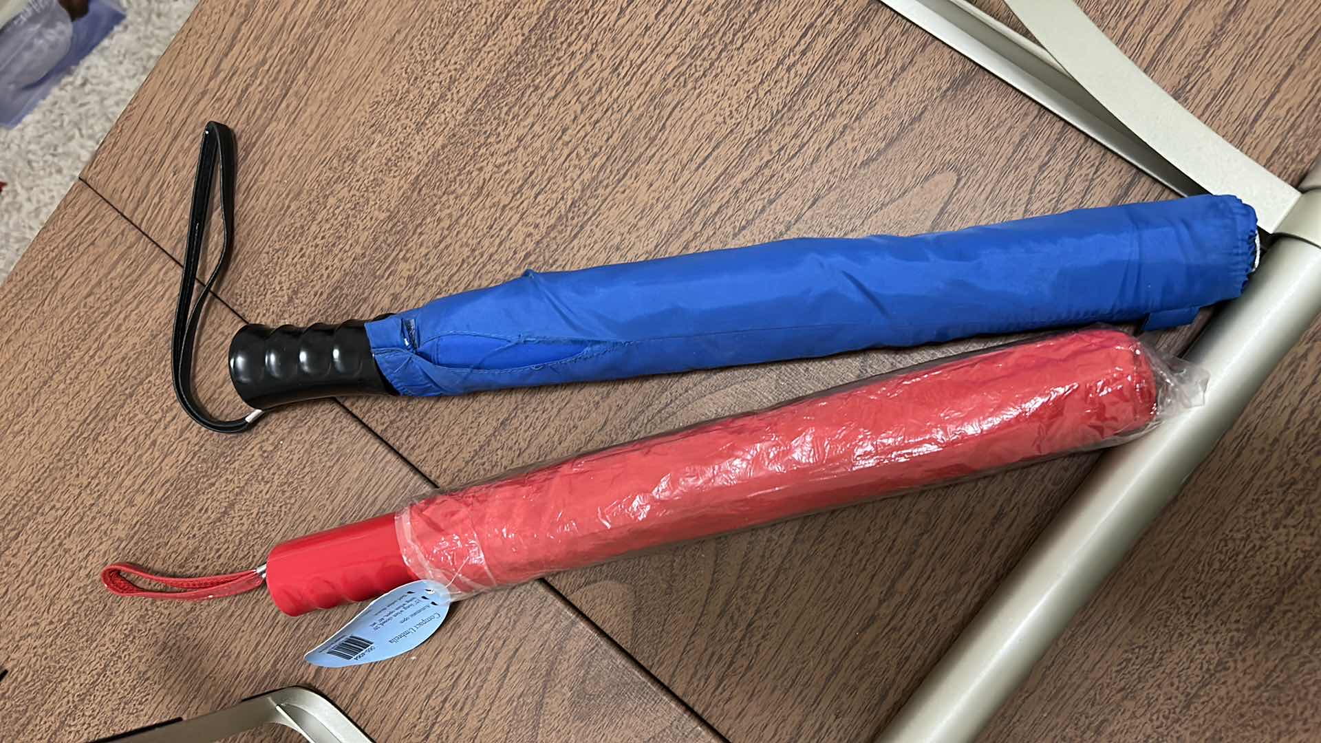 Photo 1 of HOME ASSORTMENT, 2 OVER THE DOOR RODS, 2 UMBRELLAS, TIMERS AND SURGE STRIP