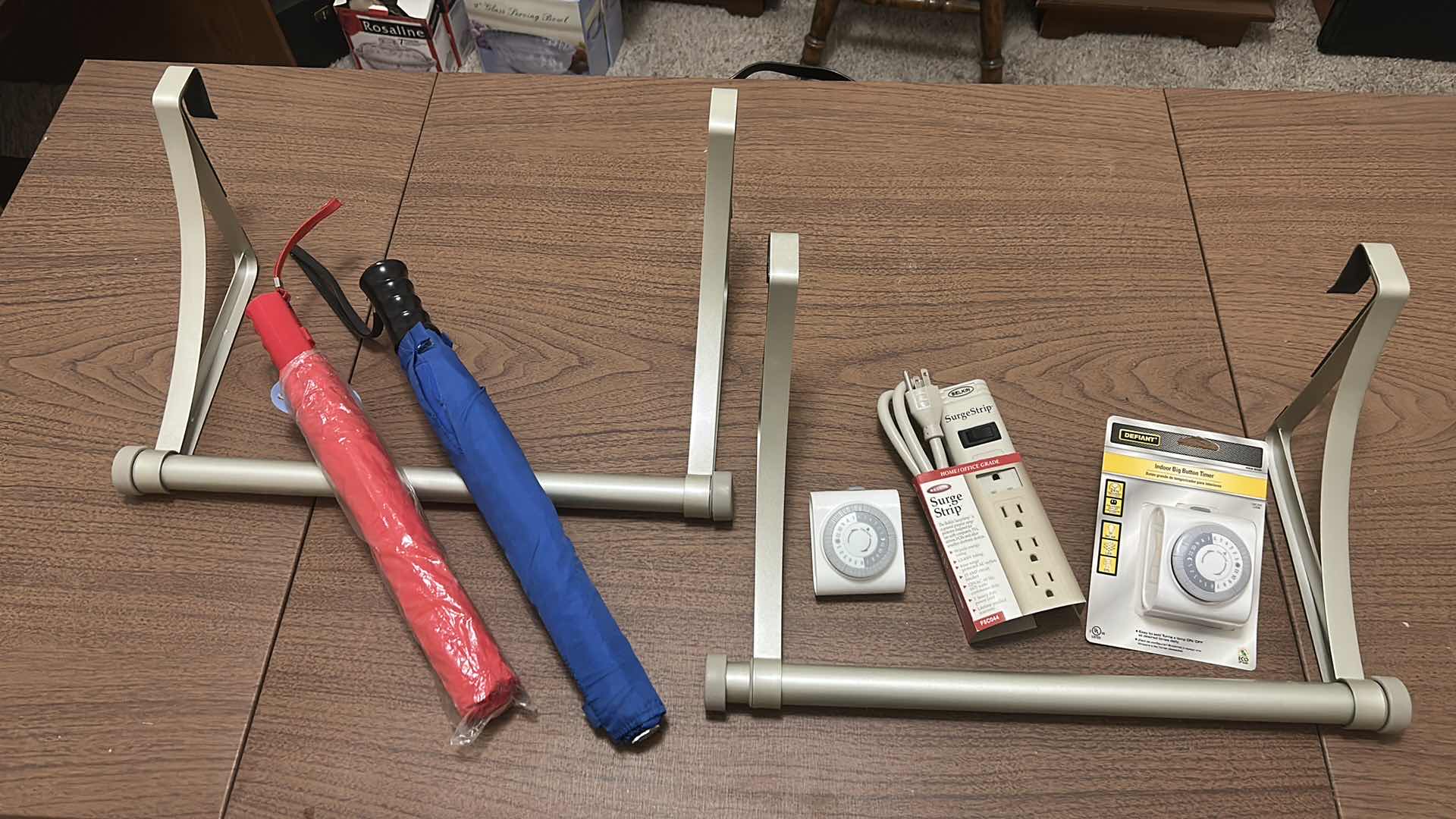 Photo 1 of HOME ASSORTMENT, 2 OVER THE DOOR RODS, 2 UMBRELLAS, TIMERS AND SURGE STRIP