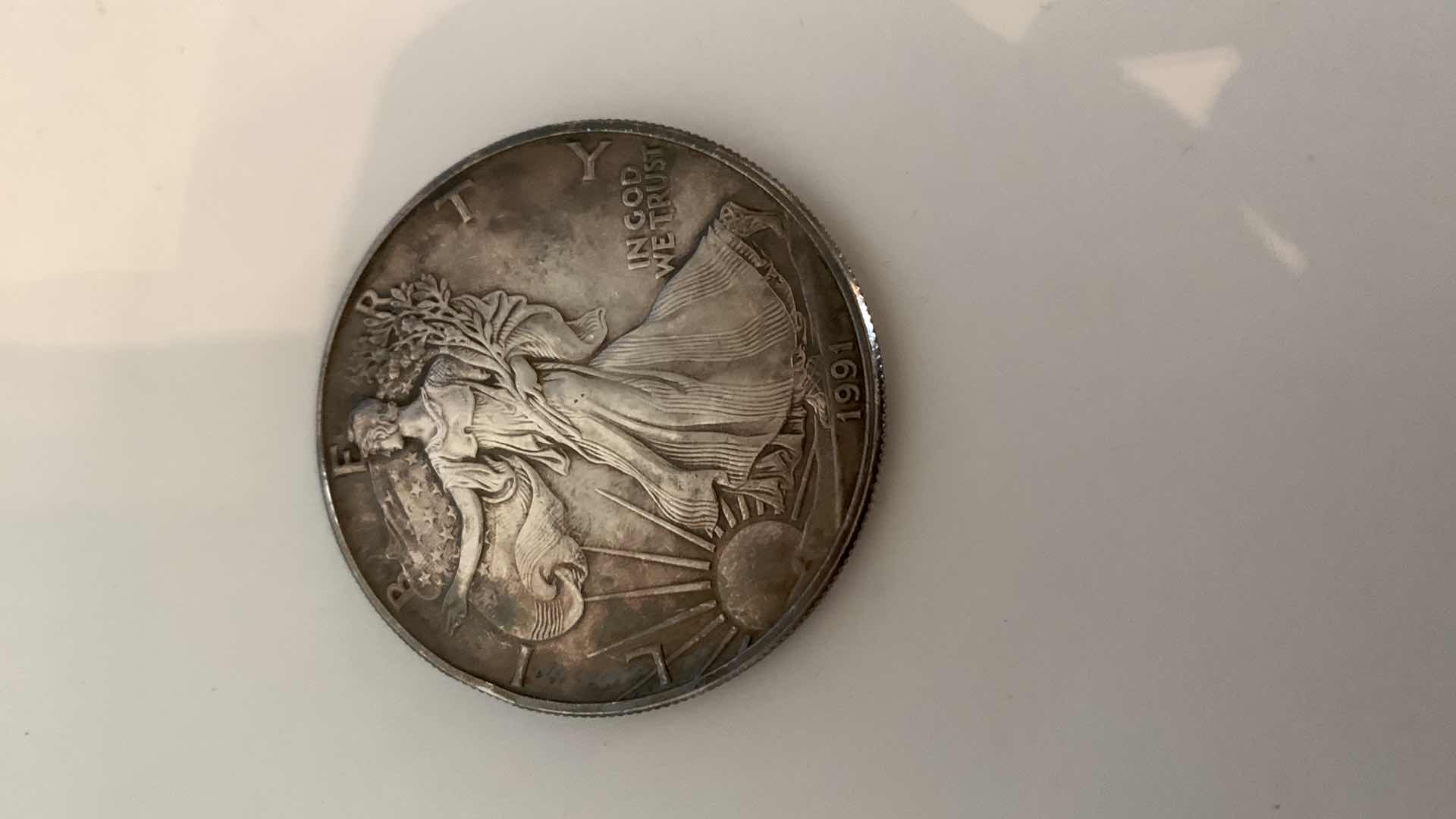 Photo 1 of 1991 AMERICAN SILVER EAGLE DOLLAR 1OZ .999 SILVER NATURAL TONING
