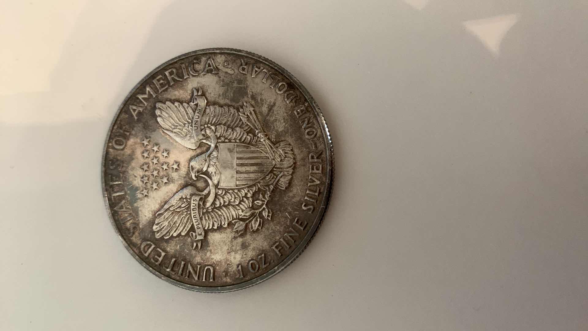 Photo 1 of 1991 AMERICAN SILVER EAGLE DOLLAR 1OZ .999 SILVER NATURAL TONING