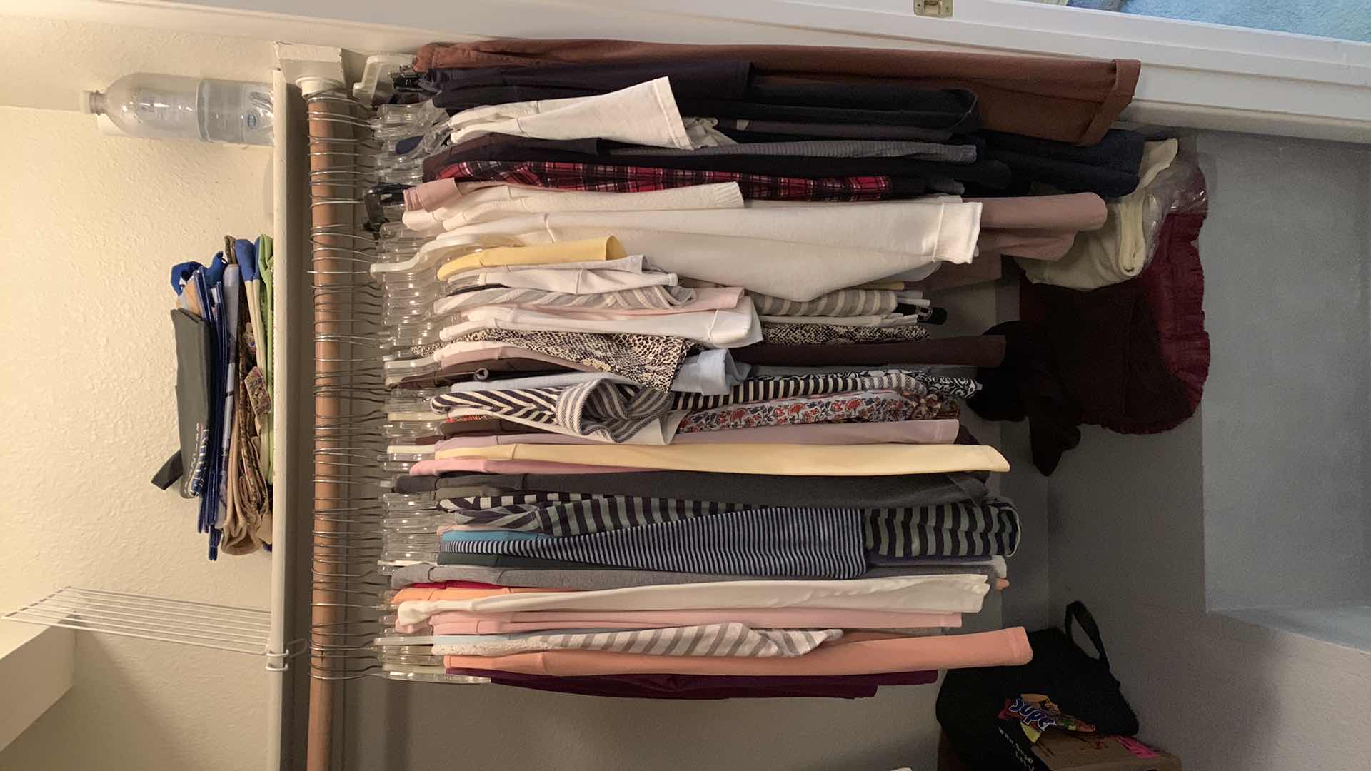 Photo 1 of CONTENTS OF CLOSET WOMENS CLOTHING SIZE L