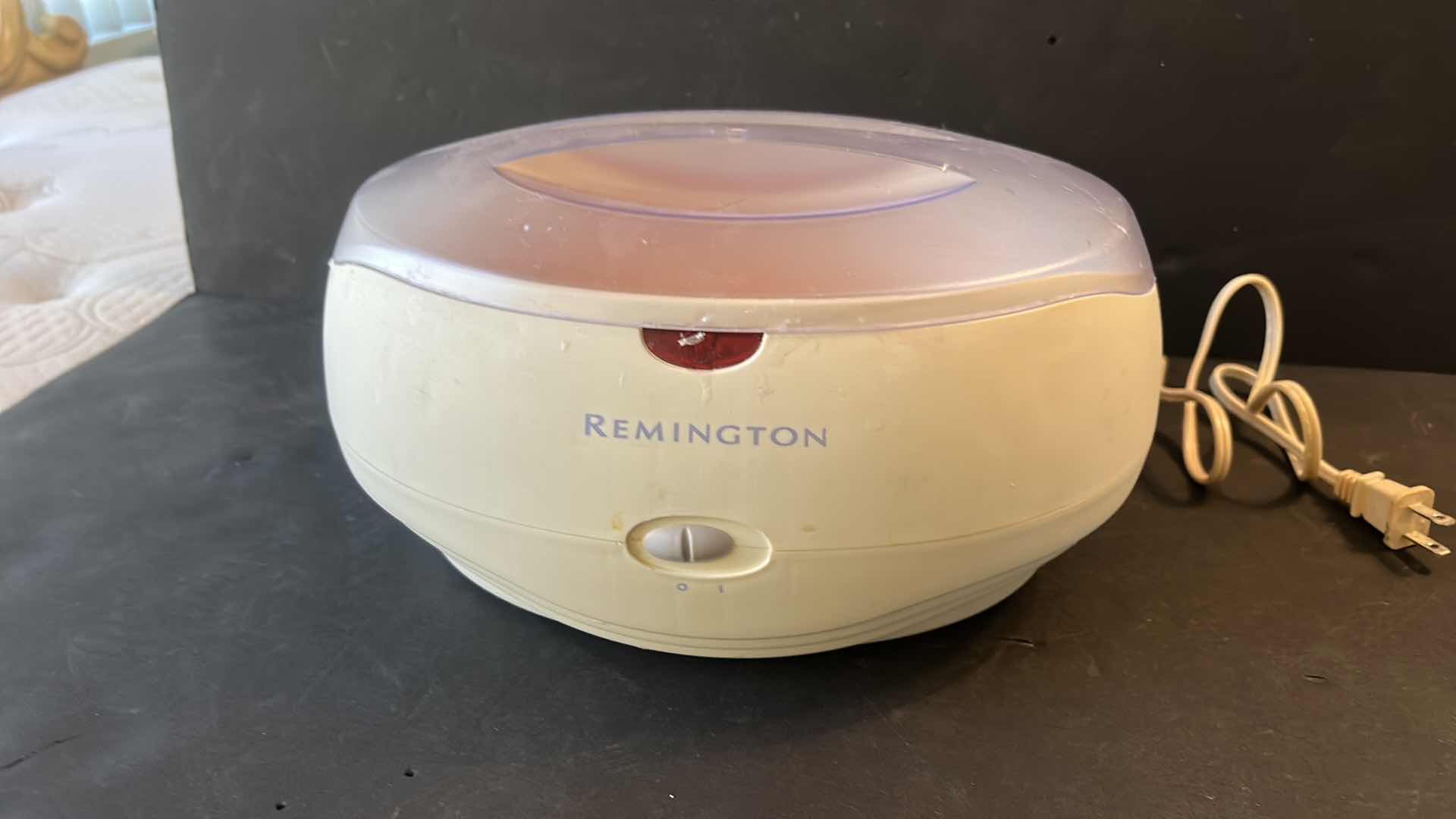 Photo 1 of REMINGTON WAXER AND WAX