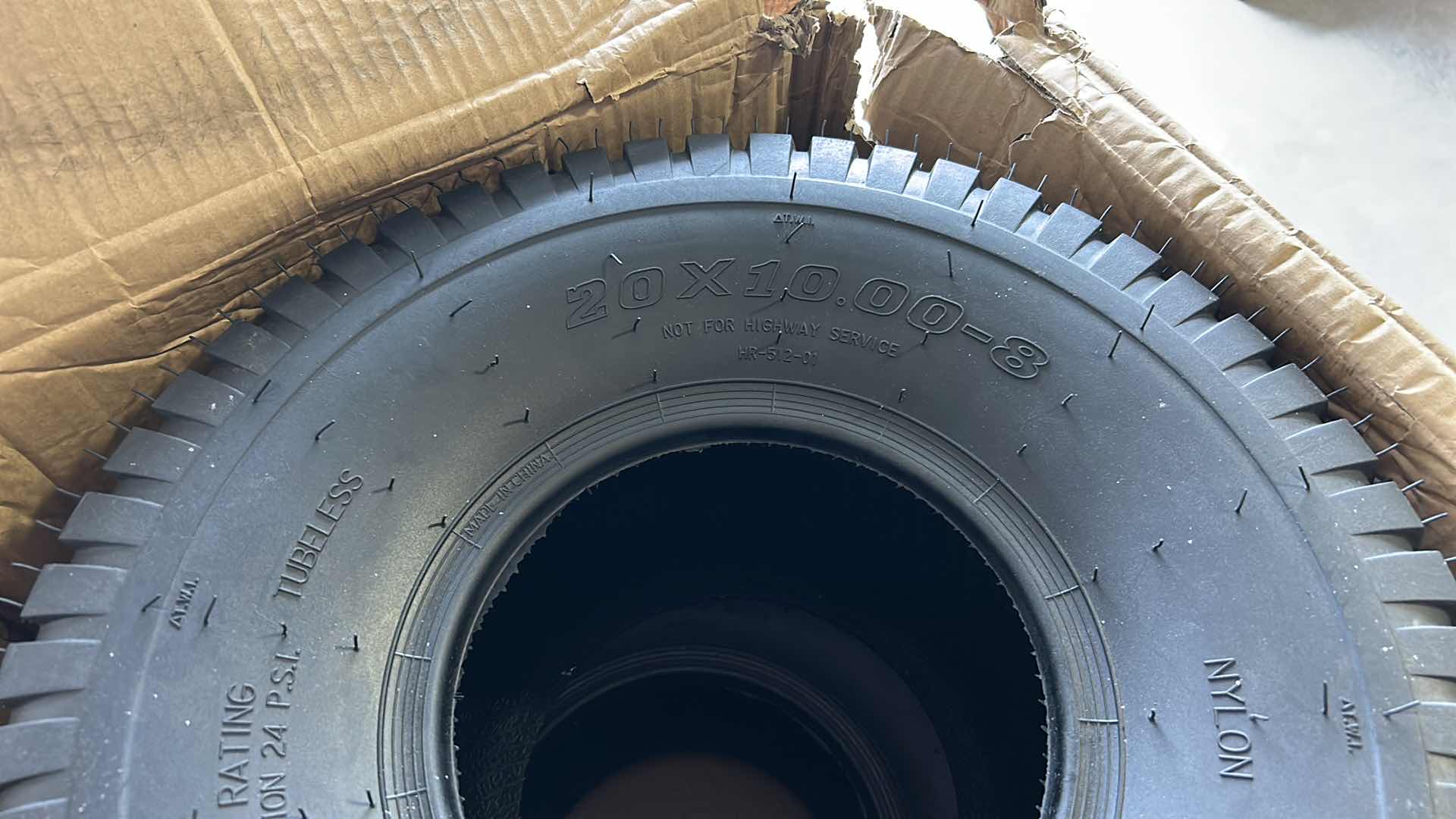 Photo 1 of BOX OF 2 - 4 PLY TUBELESS TIRES - 20 X 10-8