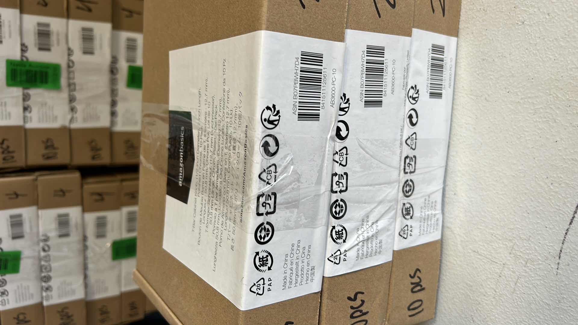 Photo 1 of AMAZON BASICS T-BAR CABINET KNOBS POLISHED CHROME 3 BOXES OF 10