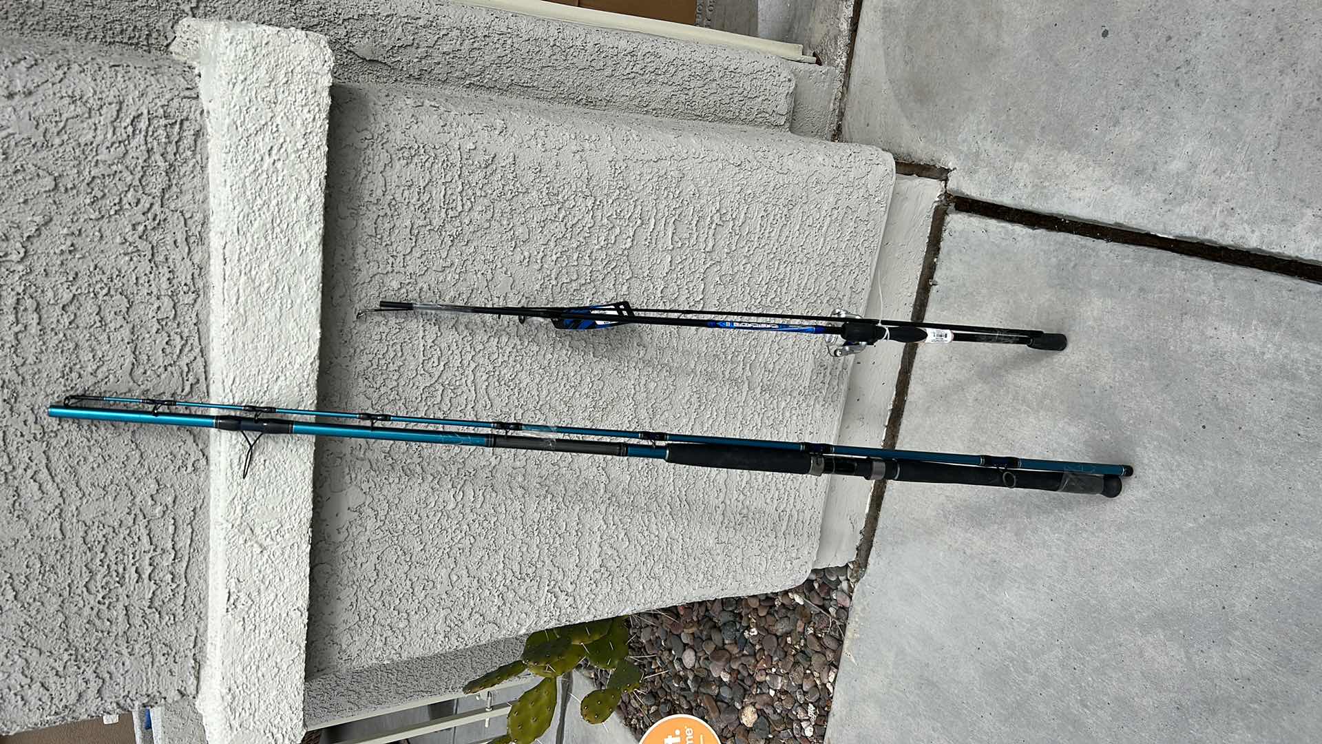 Photo 1 of 2 SETS OF FISHING POLES