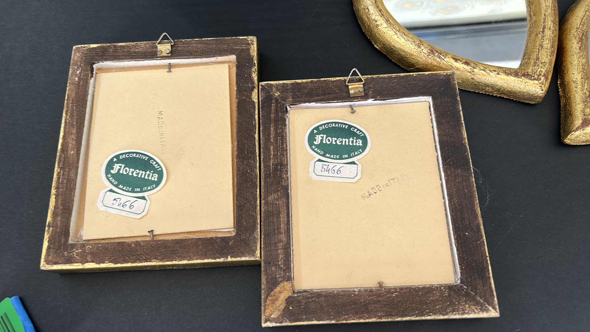 Photo 1 of HOME DECOR ASSORTMENT, NEEDLE POINT PEACOCK 12.5” x 12.5” ITALIAN ARTWORK IN GOLD FRAMES AND 3 ITALIAN GOLD FRAMED HEART MIRRORS