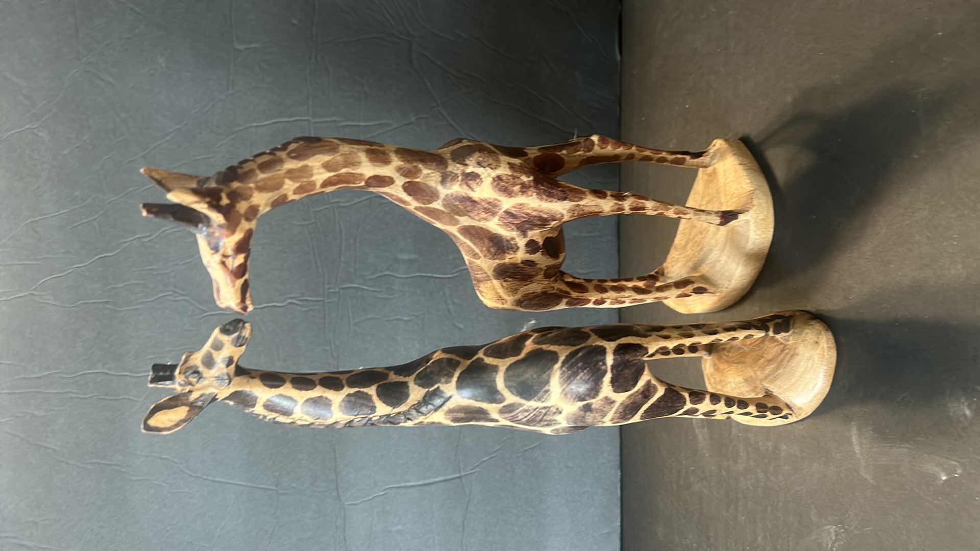 Photo 1 of HOME DECOR ASSORTMENT- 2 PAINTED WOOD GIRAFFES  H12” AND ARTWORK