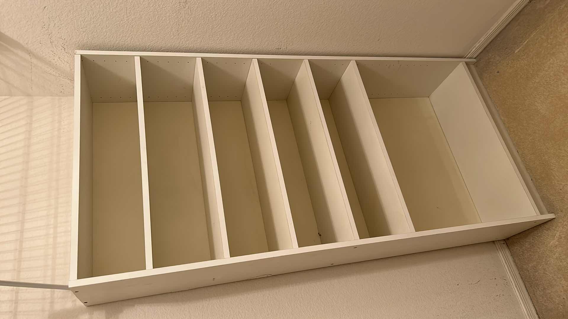 Photo 1 of WHITE SHELVING UNIT 28” x 10” x 5’