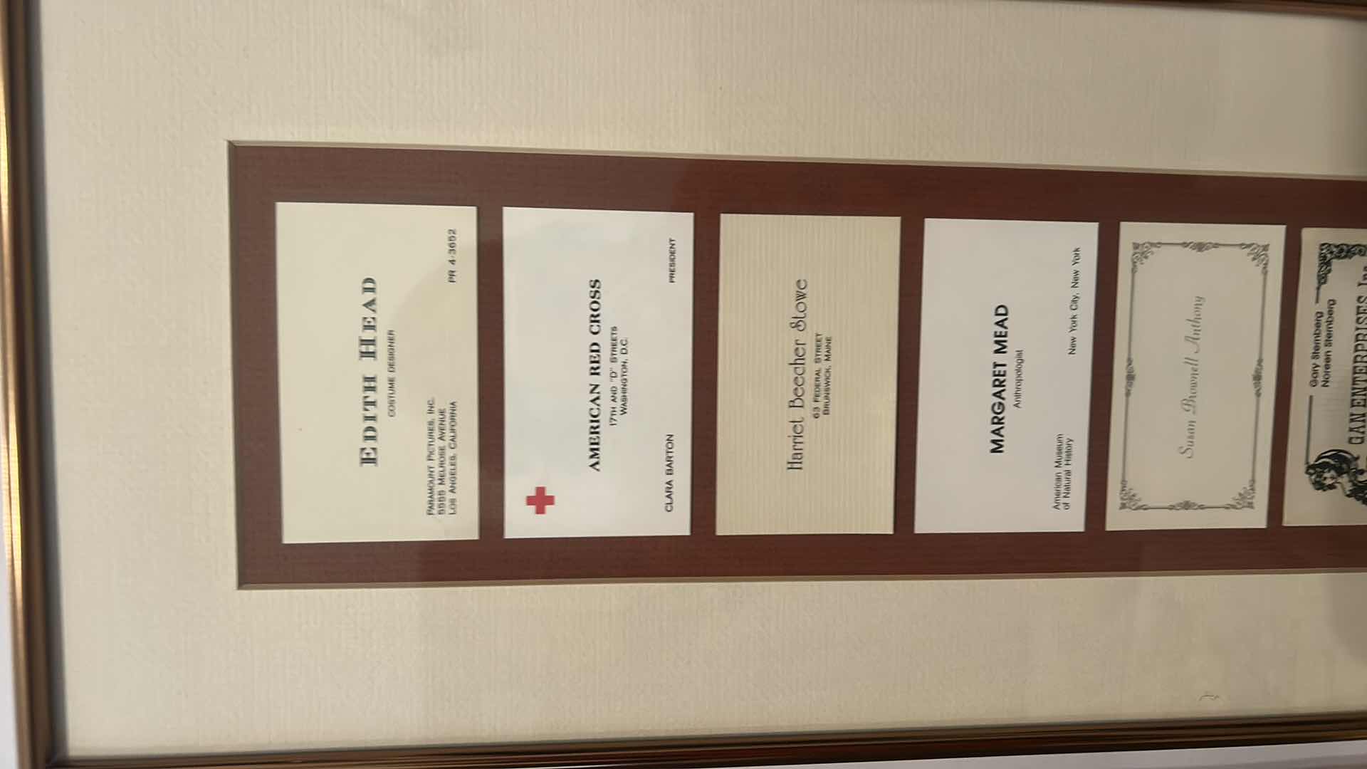 Photo 1 of COLLECTION OF VINTAGE RARE CALLING CARDS, INCLUDING MARGARET MEAD, ETHEL BARRYMORE, EMILY POST, ELEANOR ROOSEVELT, ALBERT EINSTEIN, JOHN D ROCKEFELLER AND MANY MORE, FRAMED ARTWORK eight and three-quarter inches by 30 inches