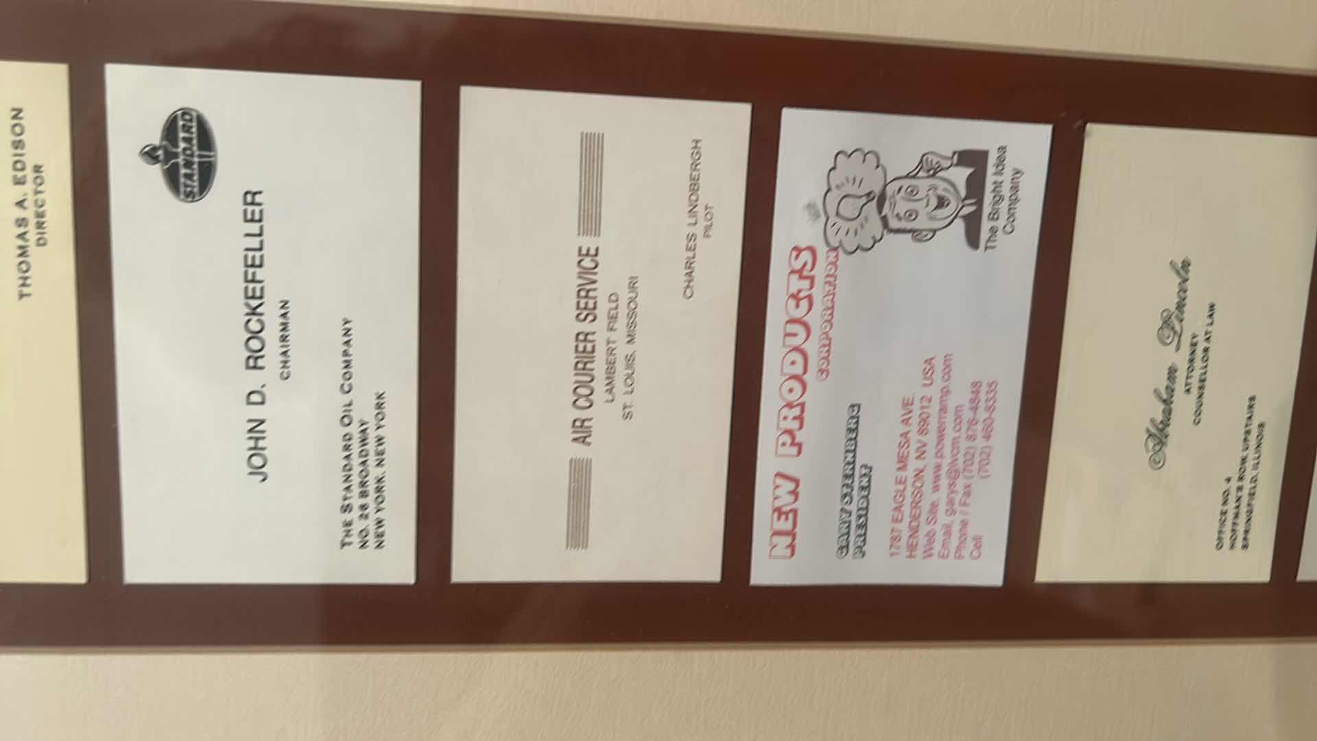 Photo 1 of COLLECTION OF VINTAGE RARE CALLING CARDS, INCLUDING MARGARET MEAD, ETHEL BARRYMORE, EMILY POST, ELEANOR ROOSEVELT, ALBERT EINSTEIN, JOHN D ROCKEFELLER AND MANY MORE, FRAMED ARTWORK eight and three-quarter inches by 30 inches