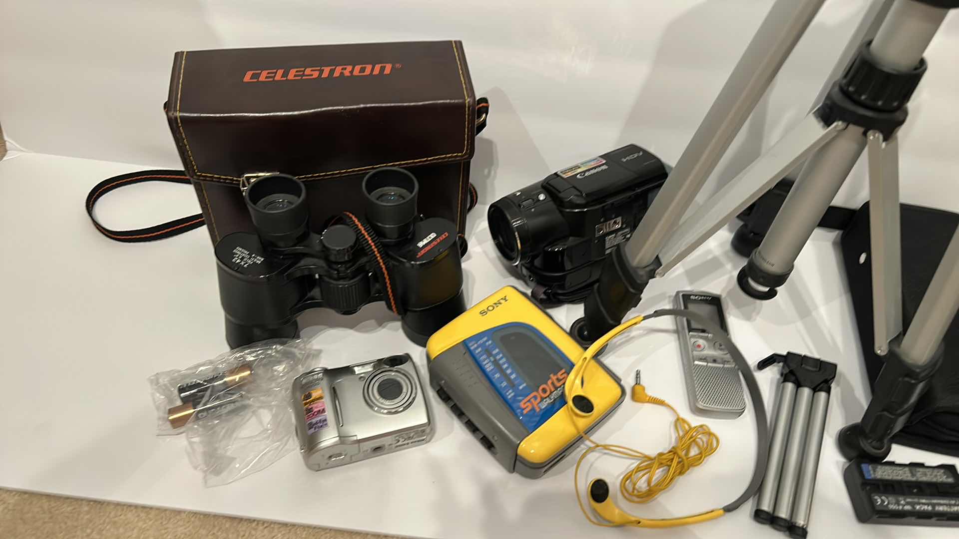 View 2 of CANON VIDEO CAMERA, NIKON CAMERA, SONY WALKMAN, TRI PODS CELESTRON BINOCULARS ANF FLOUREON KIT