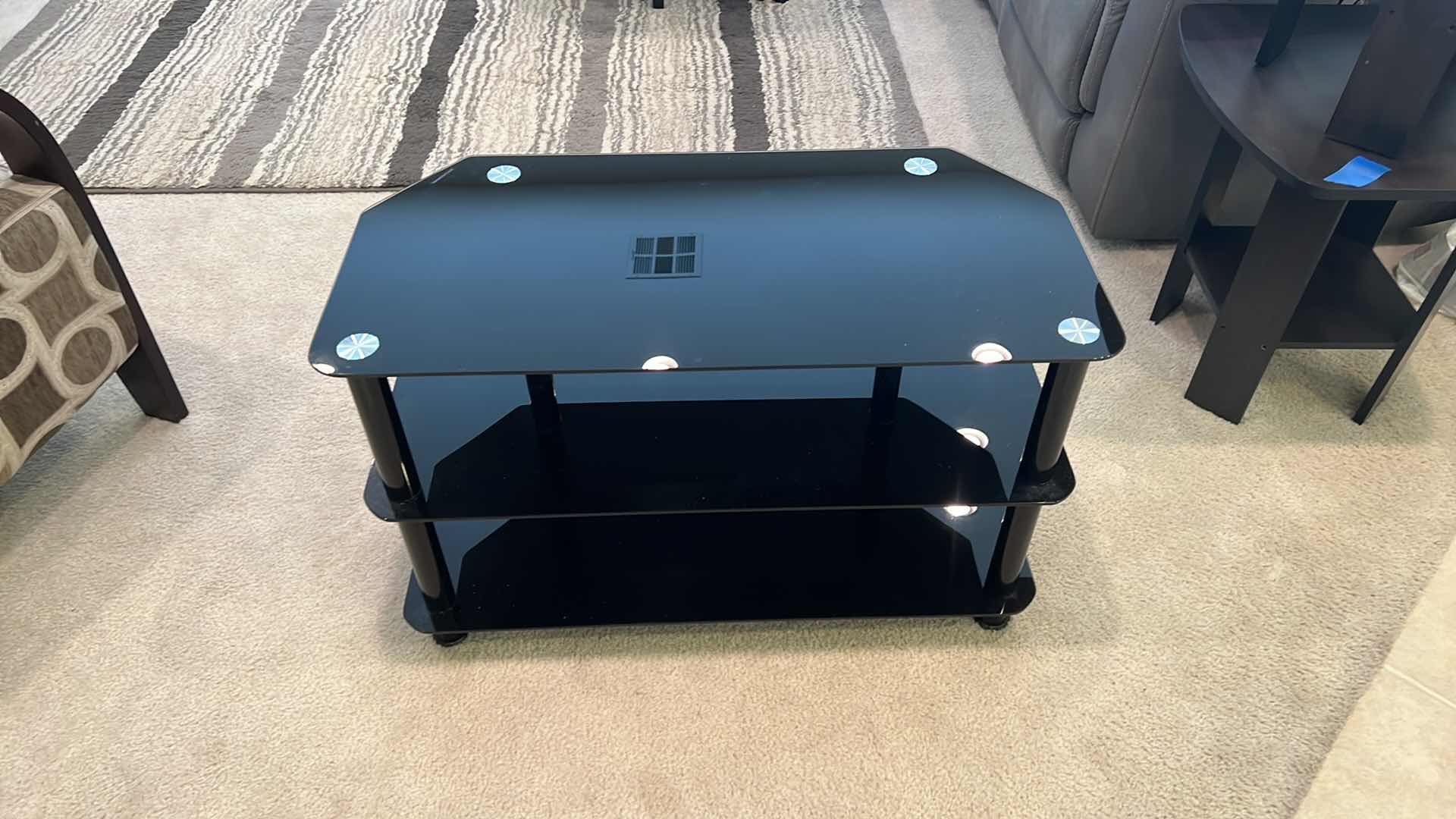 Photo 1 of BLACK GLASS ENTERTAINMENT SHELF  32” x 16” H20”