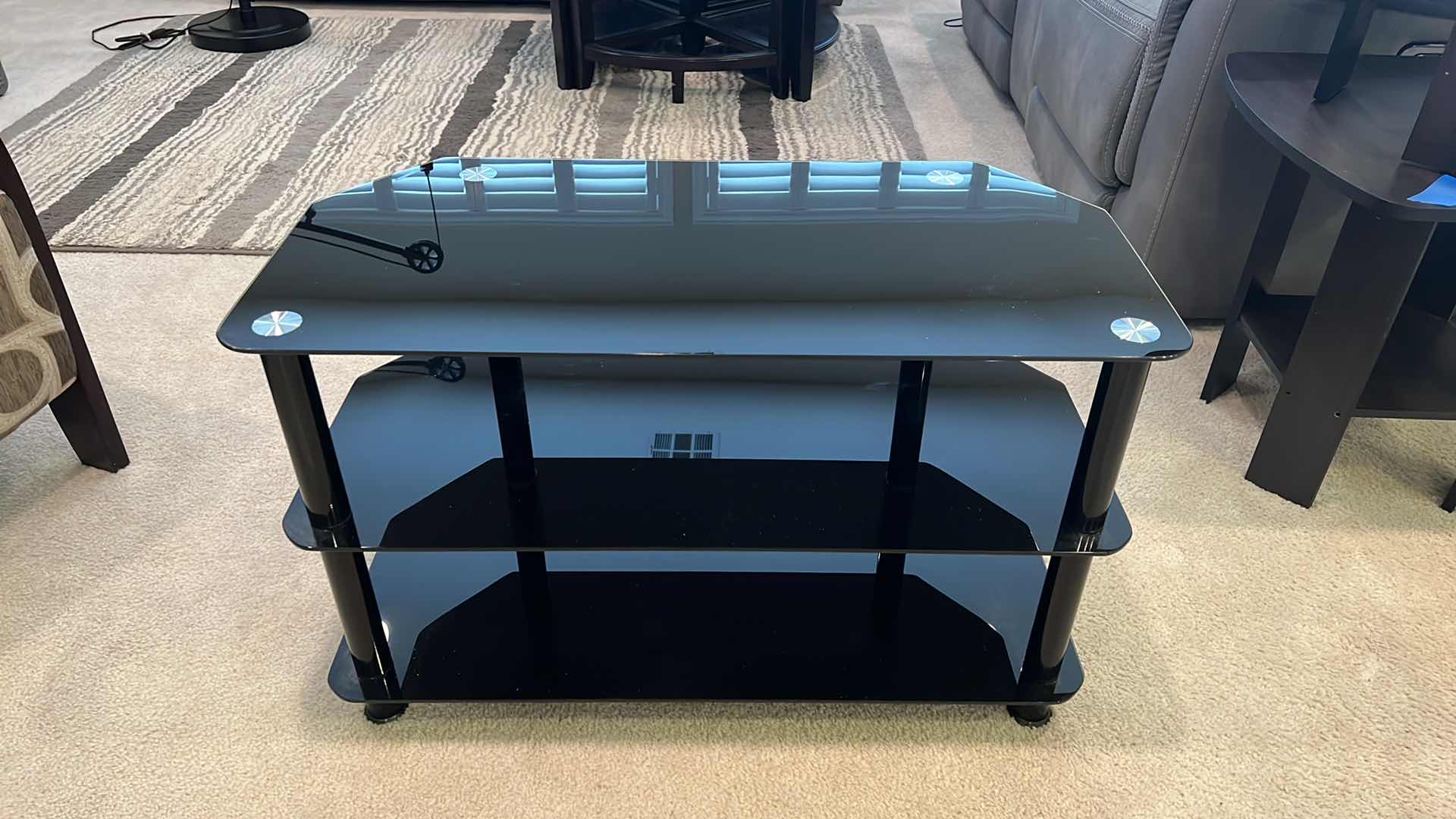 Photo 1 of BLACK GLASS ENTERTAINMENT SHELF  32” x 16” H20”