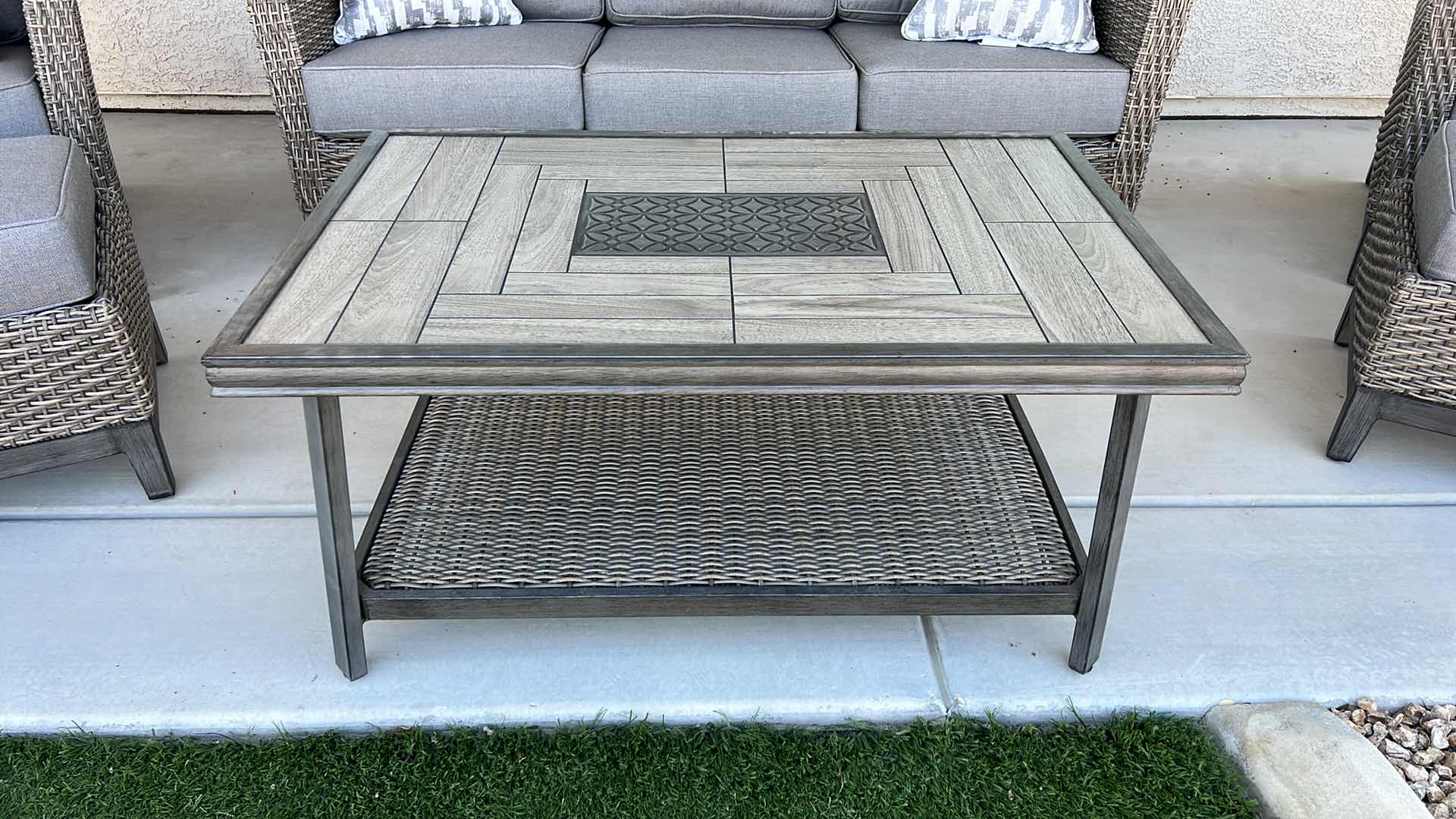 Photo 1 of SUNBRELLA WICKER W METAL PATIO TABLE & PROTECTIVE COVER 44” x 28” H22”