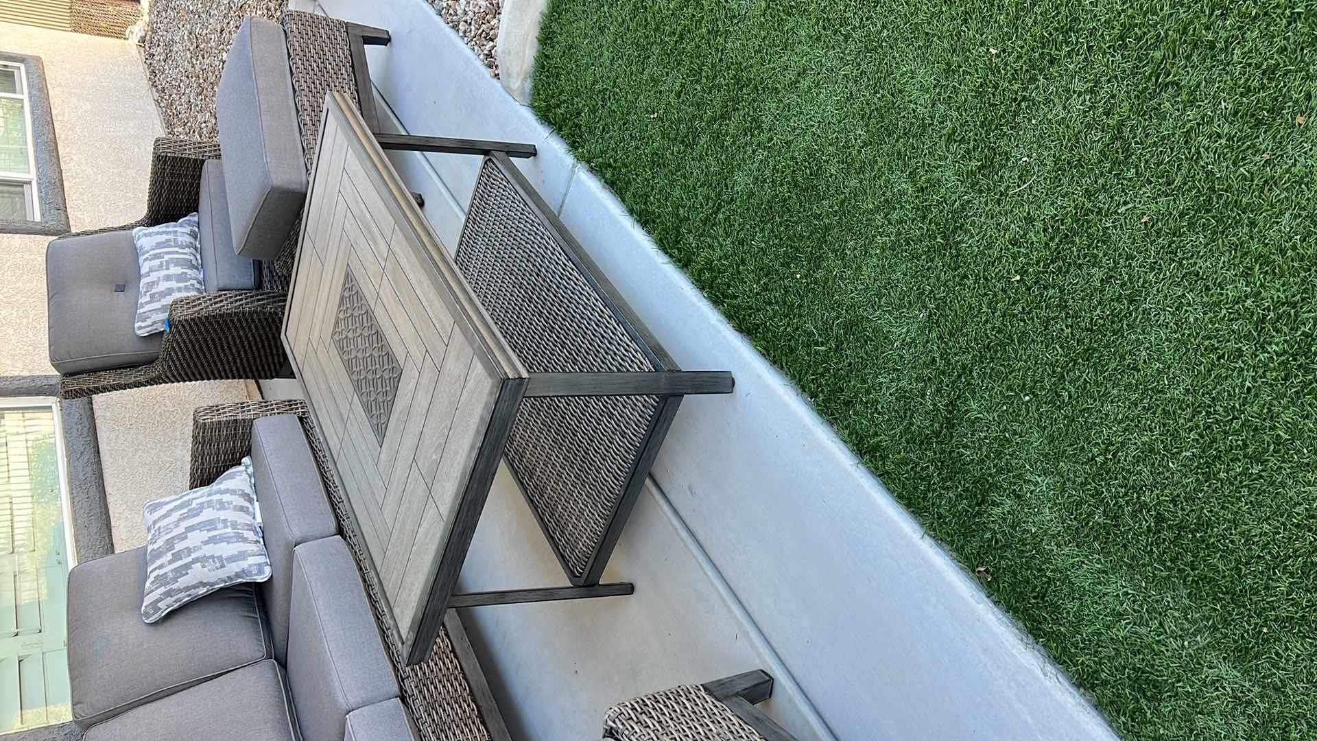 Photo 1 of SUNBRELLA WICKER W METAL PATIO TABLE & PROTECTIVE COVER 44” x 28” H22”