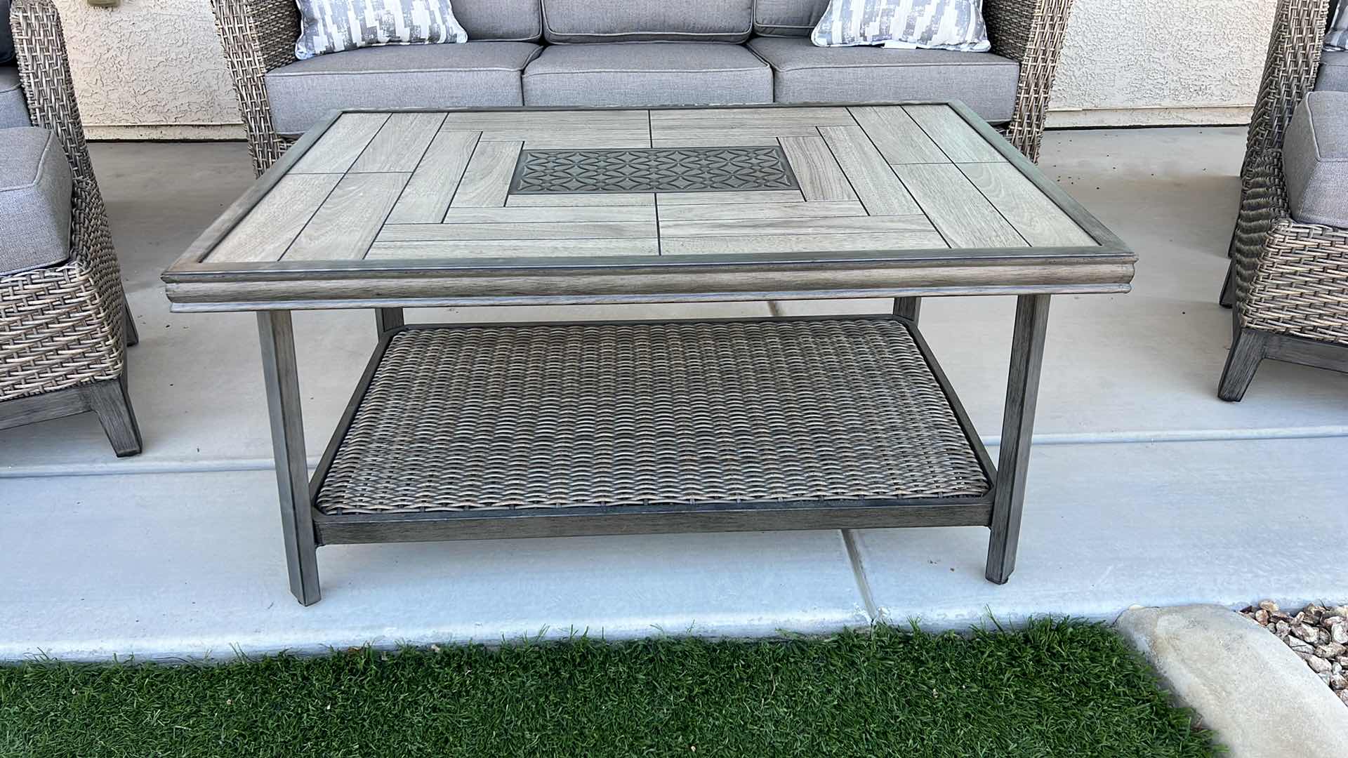 Photo 1 of SUNBRELLA WICKER W METAL PATIO TABLE & PROTECTIVE COVER 44” x 28” H22”