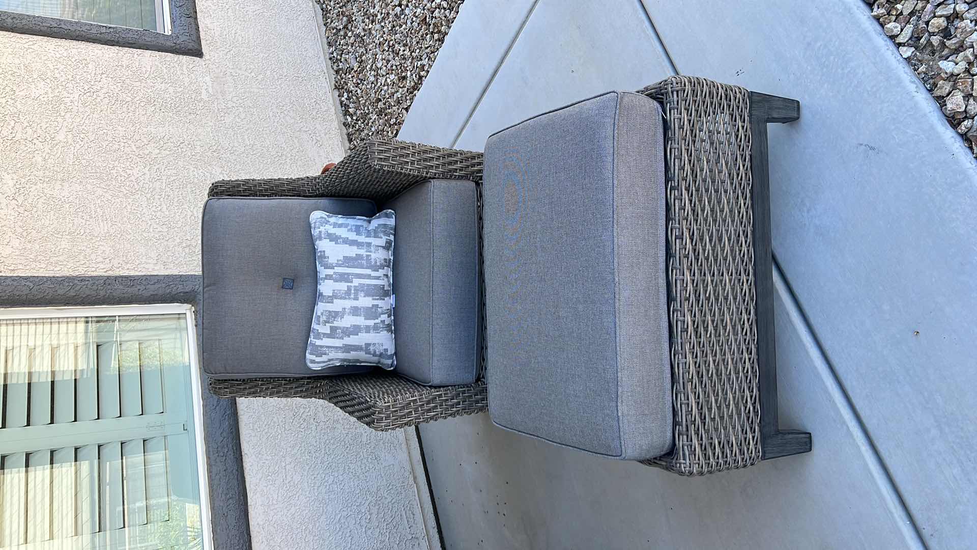 Photo 1 of SUNBRELLA WICKER PATIO CHAIR W OTTOMAN & PROTECTIVE COVER