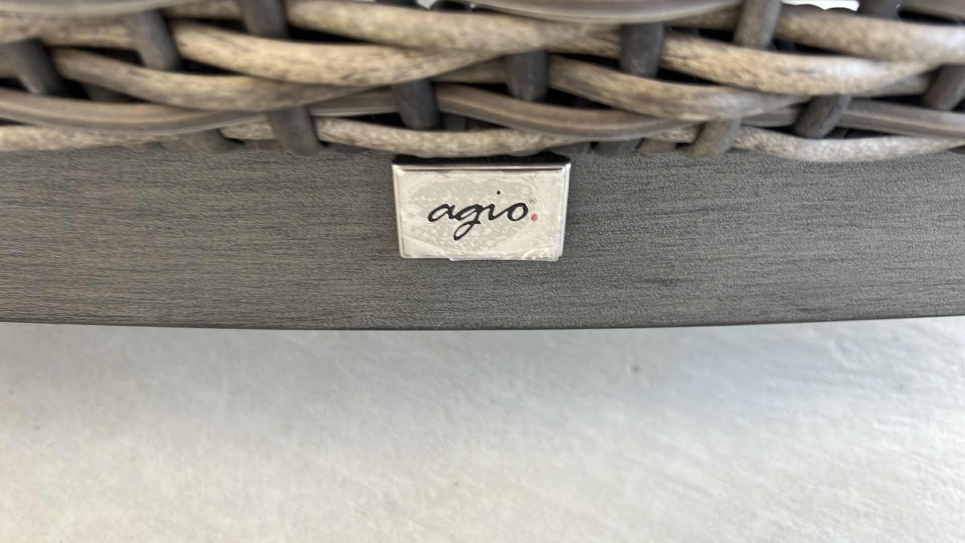 Photo 1 of SUNBRELLA WICKER PATIO CHAIR W OTTOMAN & PROTECTIVE COVER