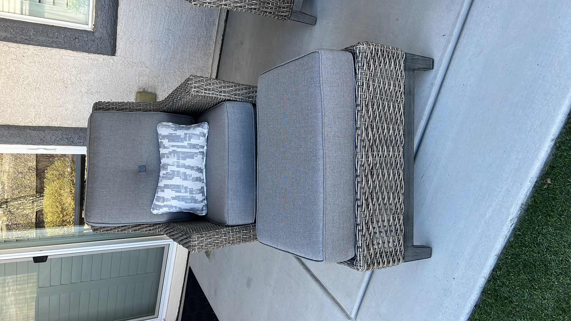 Photo 1 of SUNBRELLA WICKER PATIO CHAIR W OTTOMAN & PROTECTIVE COVER