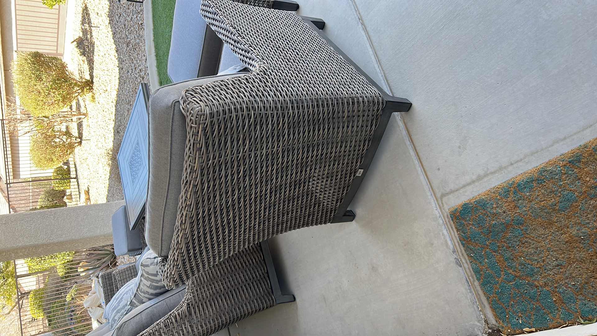 Photo 1 of SUNBRELLA WICKER PATIO CHAIR W OTTOMAN & PROTECTIVE COVER