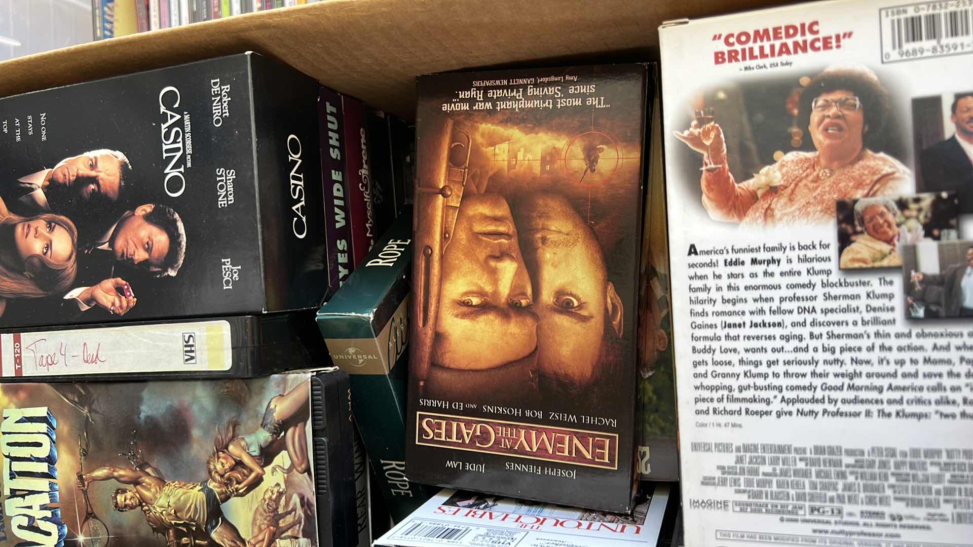 Photo 1 of BOX OF VHS TAPES