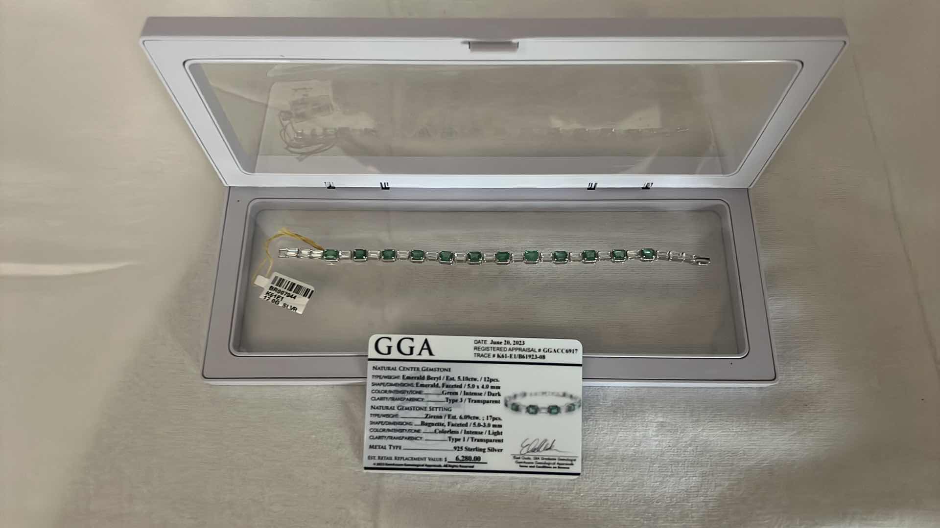 Photo 1 of 12.0 GRAMS 925 STERLING SILVER BRACELET W 6.09 CT ZIRCON & 5.10 CT EMERALD (GGA CERTIFICATE)   BR007944