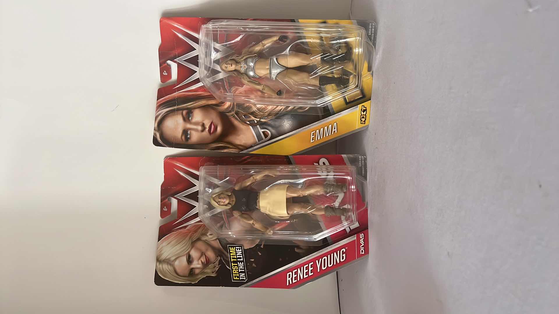 Photo 1 of 2-BRAND NEW MATTEL WWE DIVAS ACTION FIGURES (RENEE YOUNG & EMMA) $40