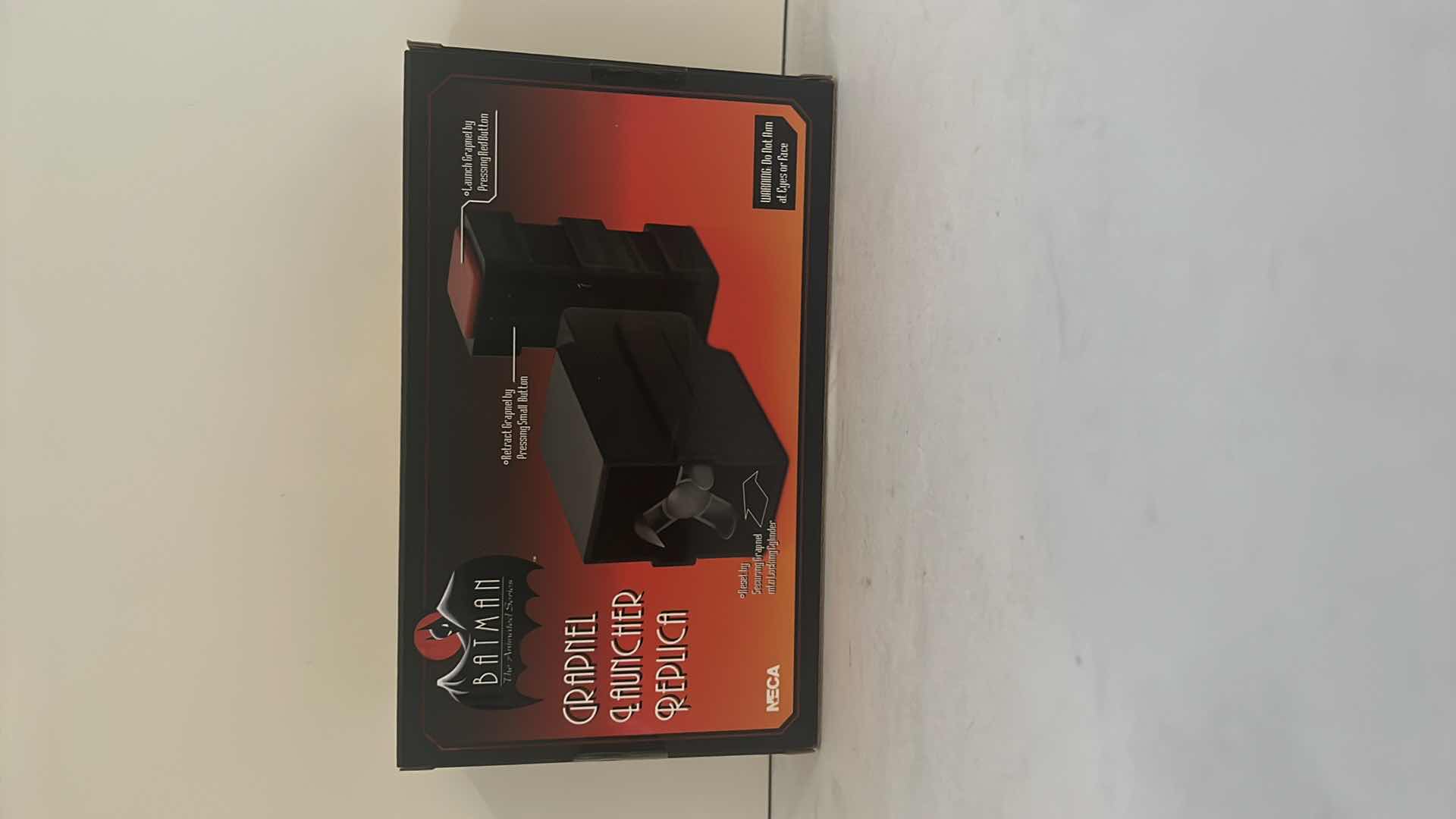 Photo 1 of BRAND NEW DC COMIC BATMAN THE ANIMATED SERIES “GRAPNEL LAUNCHER REPLICA” $25