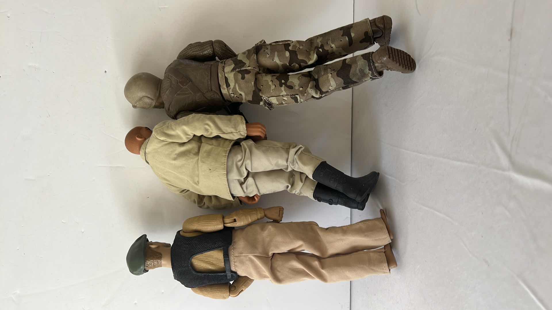 Photo 1 of 3-12” BENDABLE MILITARY MEN ACTION FIGURES