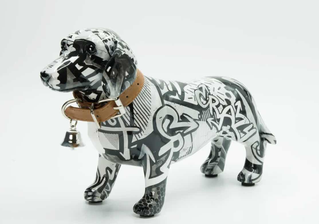 View 1 of BRANI RESIN BLACK AND WHITE DACHSHUND DOG W COLLAR 11” x 14” x 7”