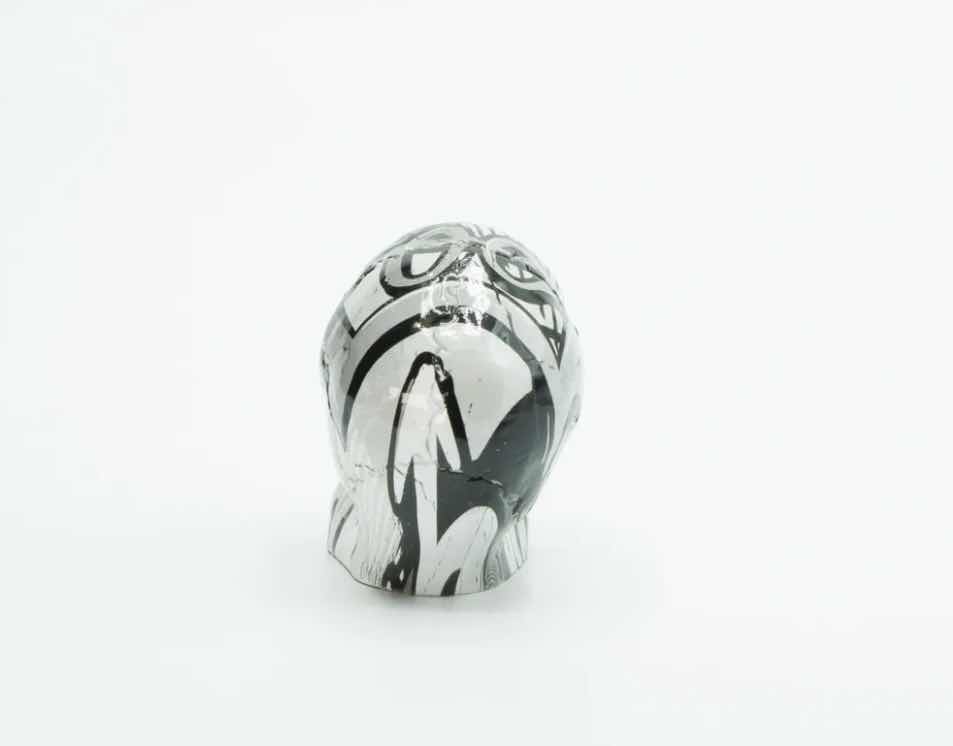 Photo 1 of BRANI BLACK & WHITE SMALL RESIN SKULL 2” x 3” x 3”