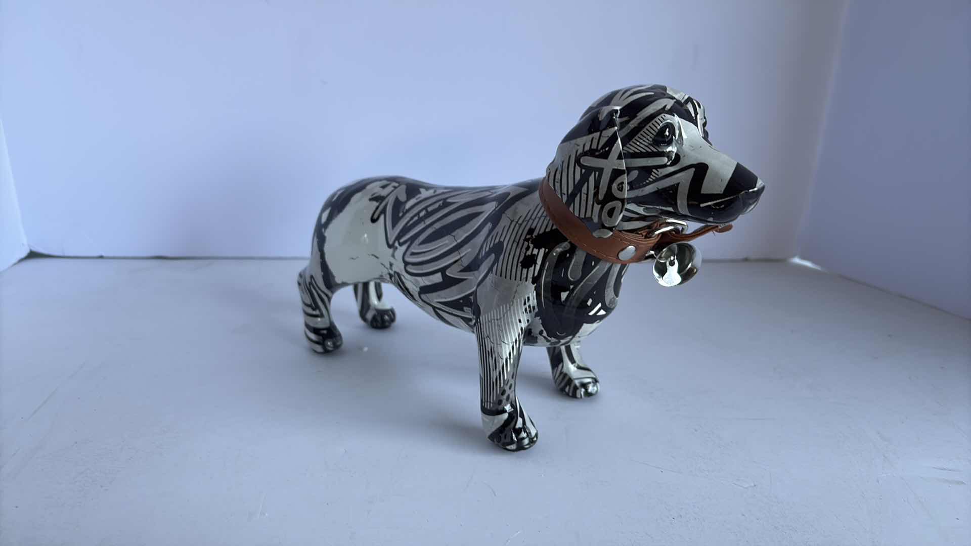 Photo 1 of BRANI COLLECTION CERAMIC FIGURES BLACK AND WHITE DACHSHUND 11”X4”X7”H
