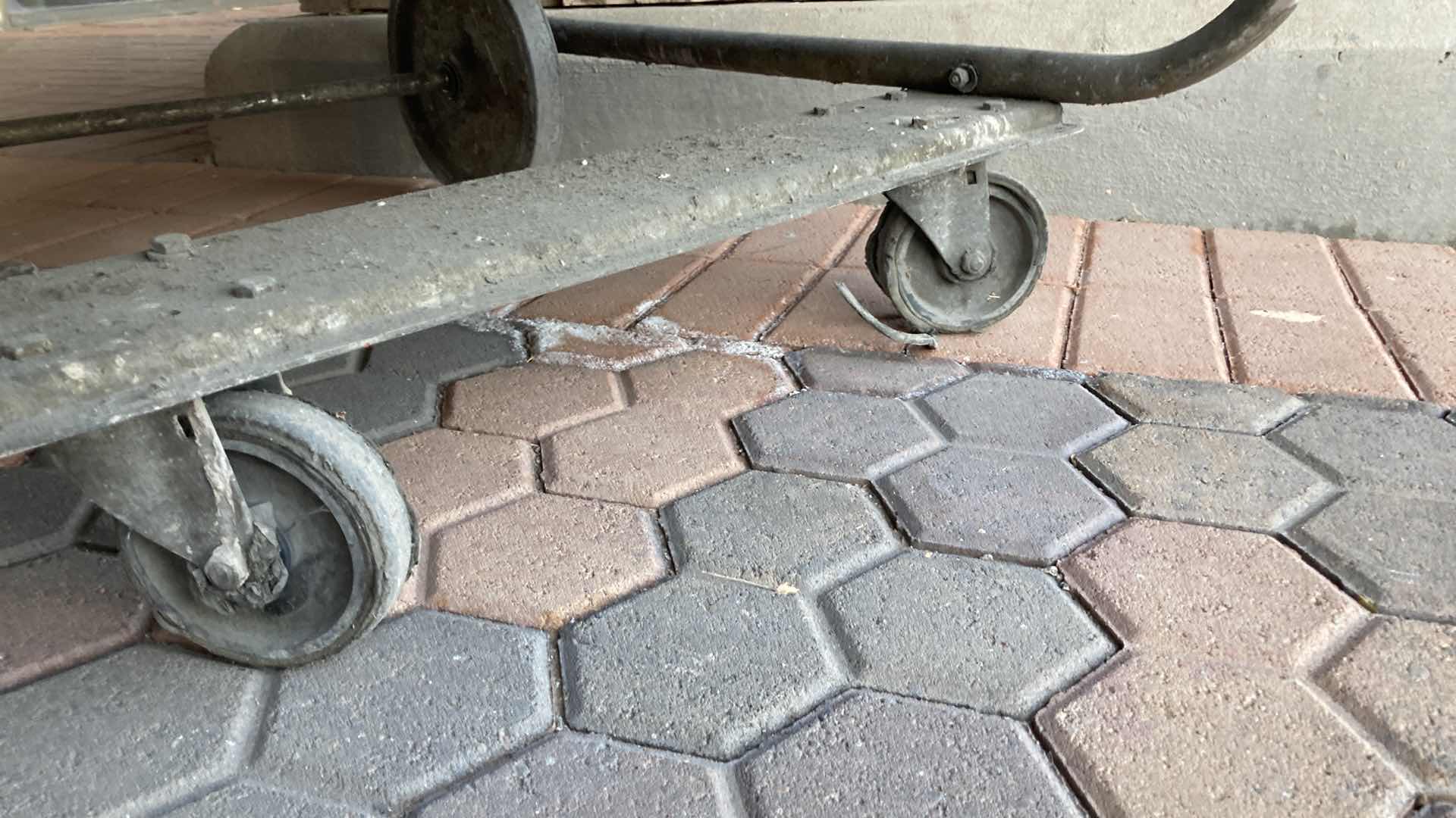 Photo 1 of STAINLESS STEEL 3 TIER ROLLING CART 40” X 27” H 35”