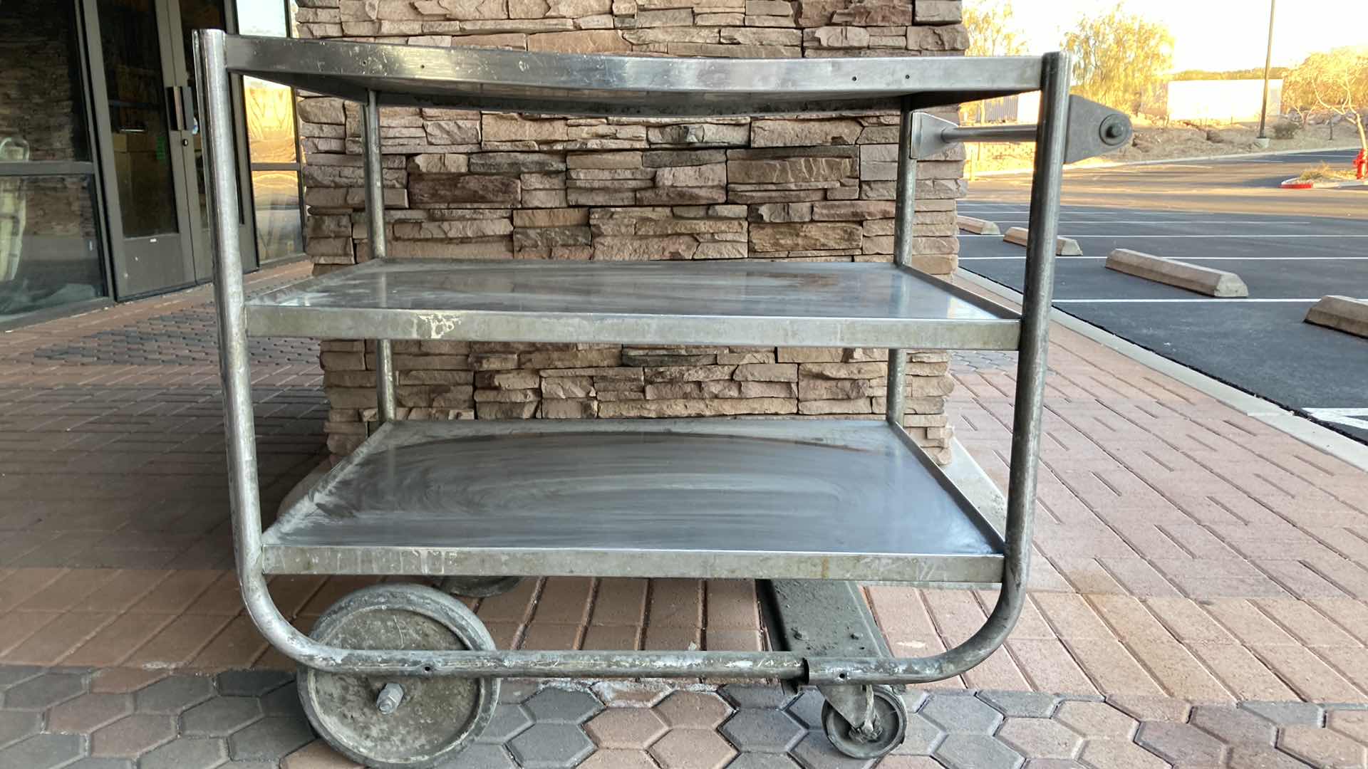 Photo 1 of STAINLESS STEEL 3 TIER ROLLING CART 40” X 27” H 35”