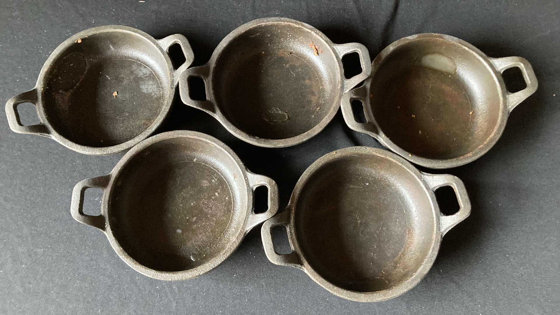 Photo 1 of CAST IRON 4.5” SKILLETS (4)