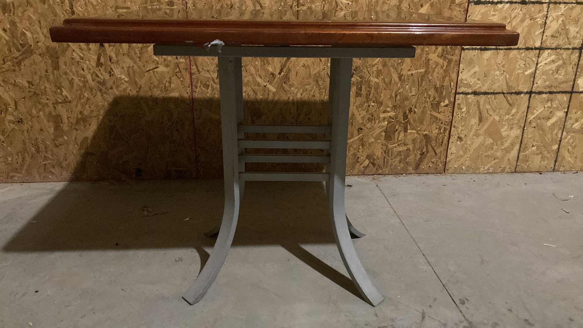 Photo 2 of DESIGN WORKS RESIN COATED TABLE TOP W SOLID STEEL BASE 38” X 30” H 30.5” (NO HARDWARE)