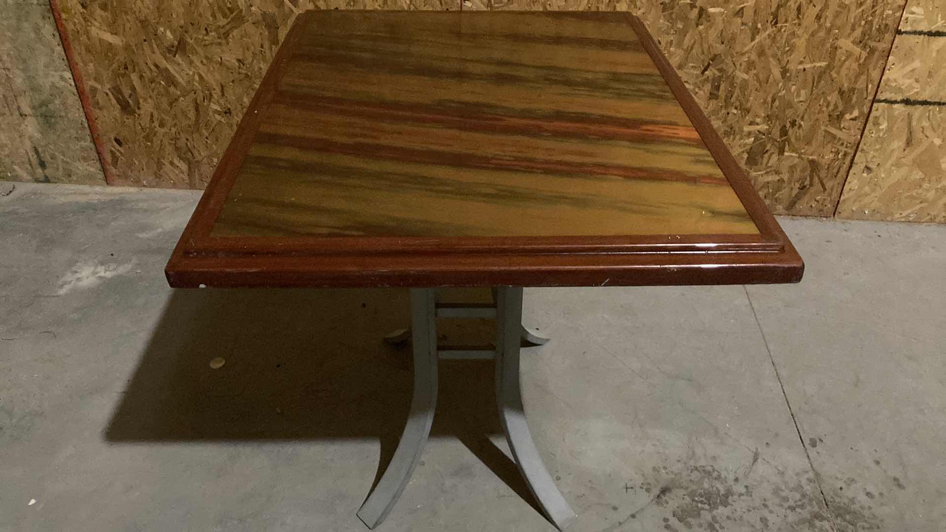 Photo 1 of DESIGN WORKS RESIN COATED TABLE TOP W SOLID STEEL BASE 38” X 30” H 30.5” (NO HARDWARE)