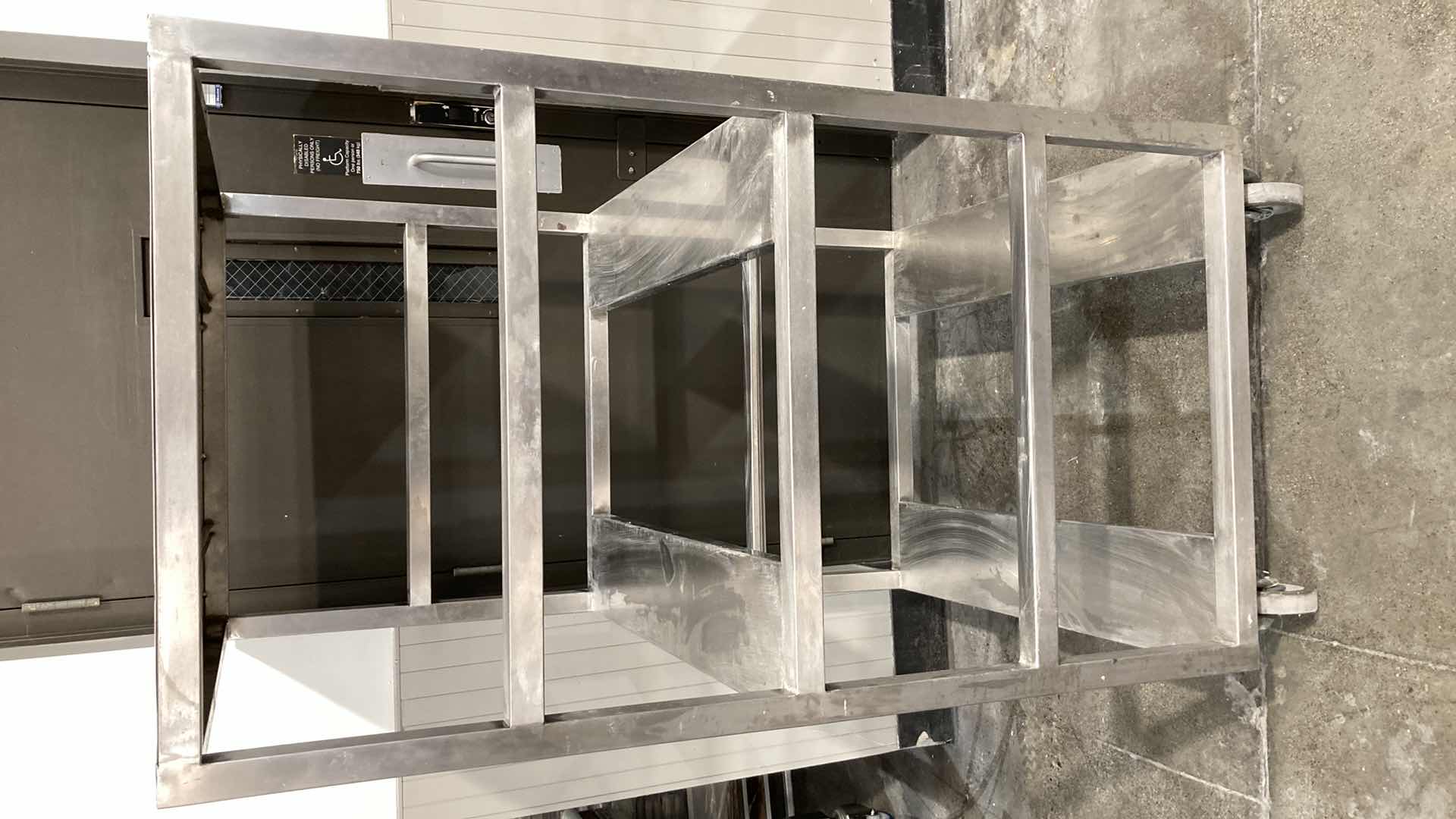 Photo 1 of STAINLESS STEEL ROLLING RACK 36.30” X 30” H 61”
