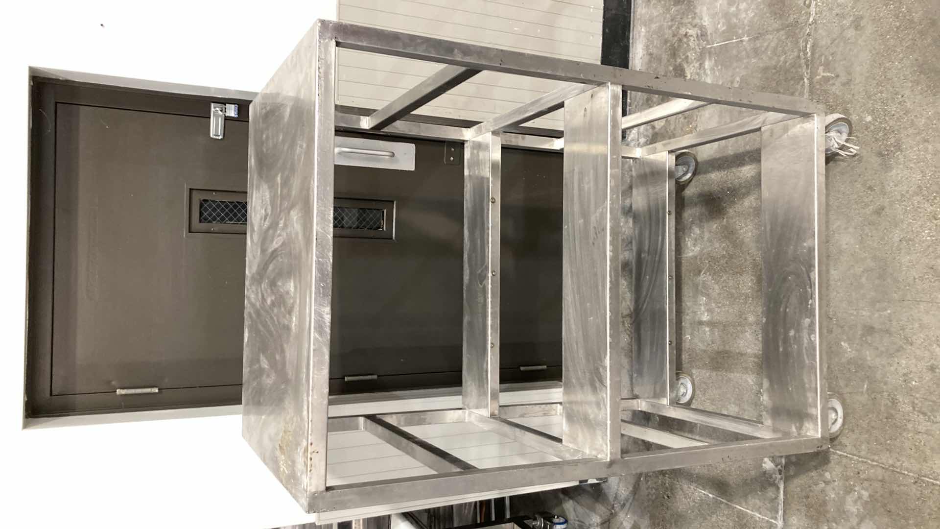 Photo 1 of STAINLESS STEEL ROLLING RACK 36.30” X 30” H 61”
