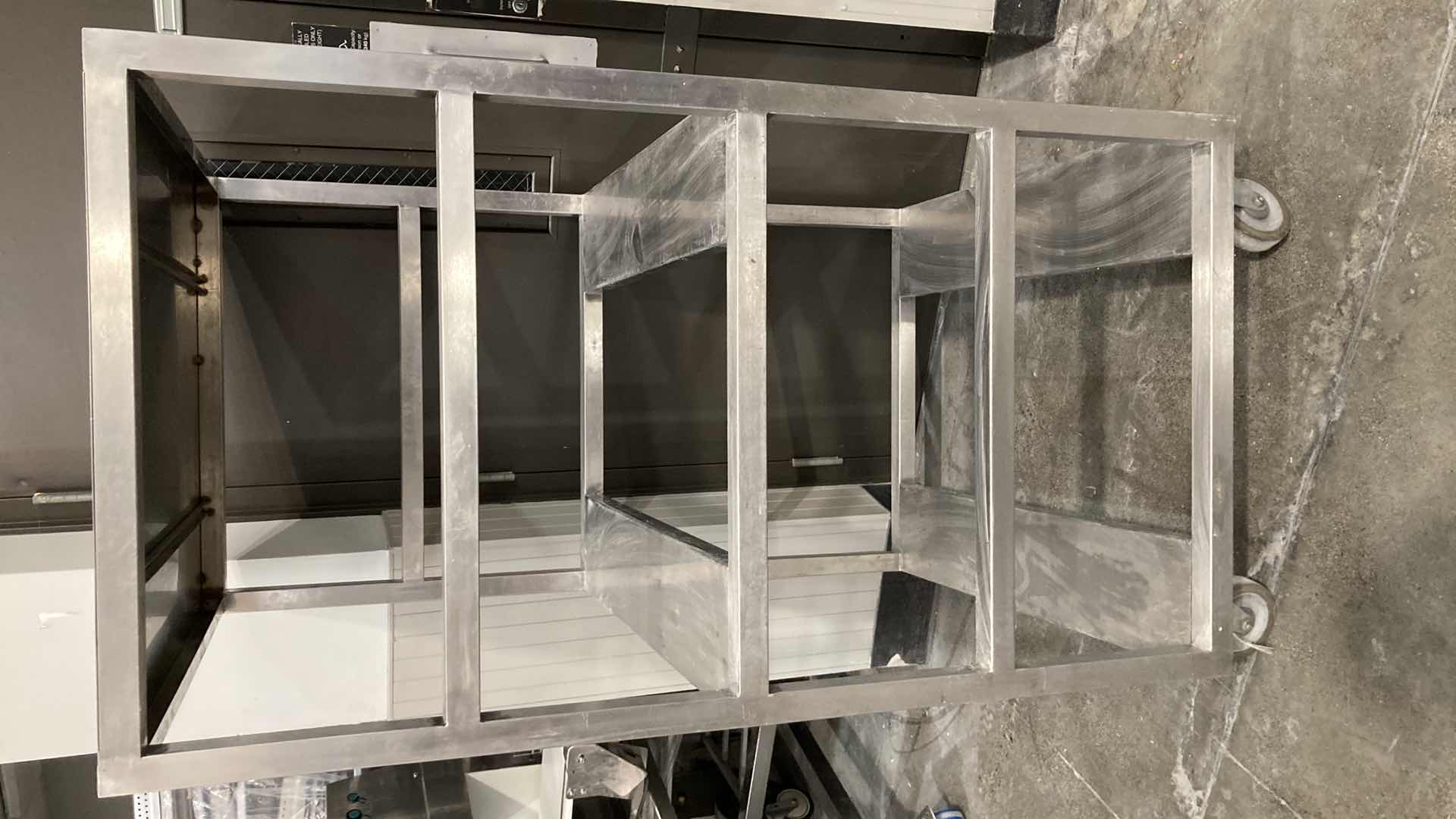 Photo 1 of STAINLESS STEEL ROLLING RACK 36.30” X 30” H 61”