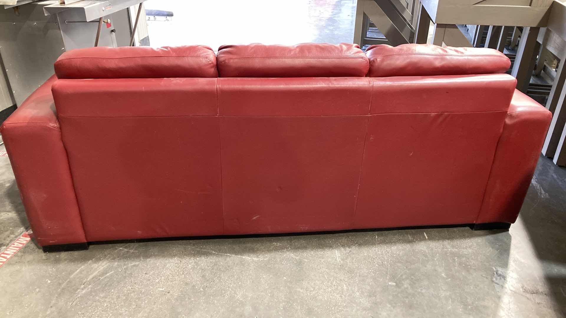 Photo 1 of F.D. STUDIOS ARTIFICIAL LEATHER RED SOFA 86” X 38” H 34” (DISPLAY MODEL)