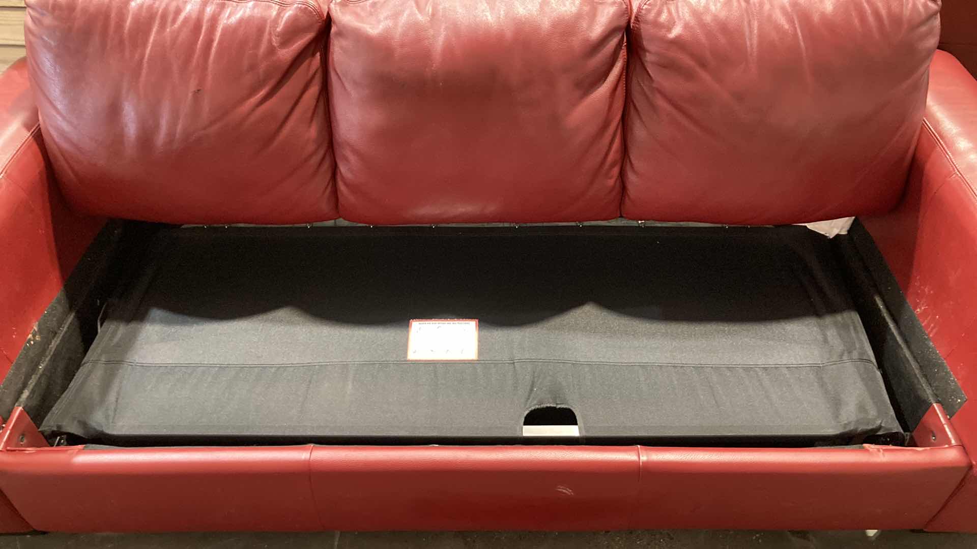 Photo 1 of F.D. STUDIOS ARTIFICIAL LEATHER RED SOFA 86” X 38” H 34” (DISPLAY MODEL)